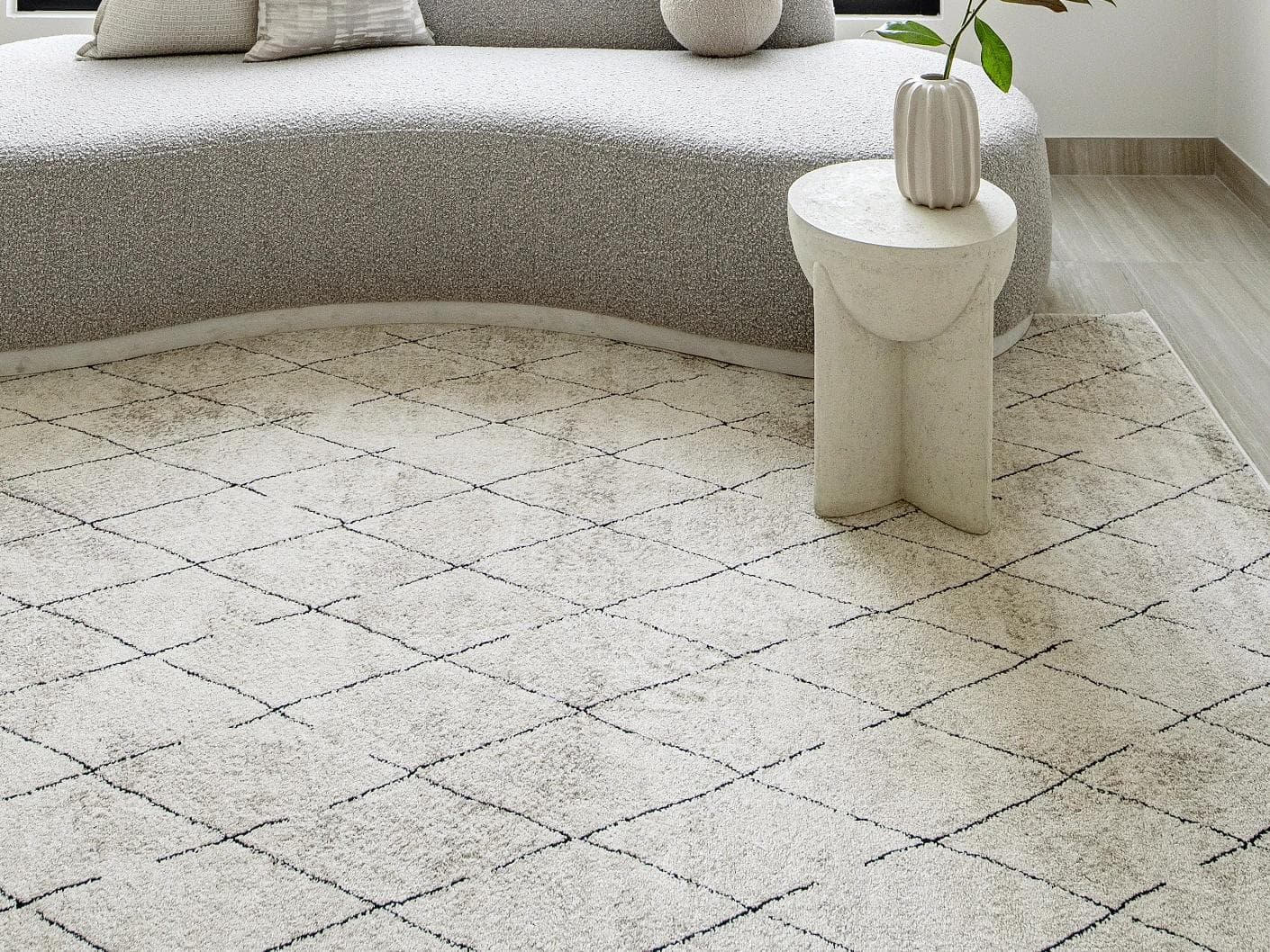 Renzo Ebony carpet in beige, shown in a lifestyle front view as image 4