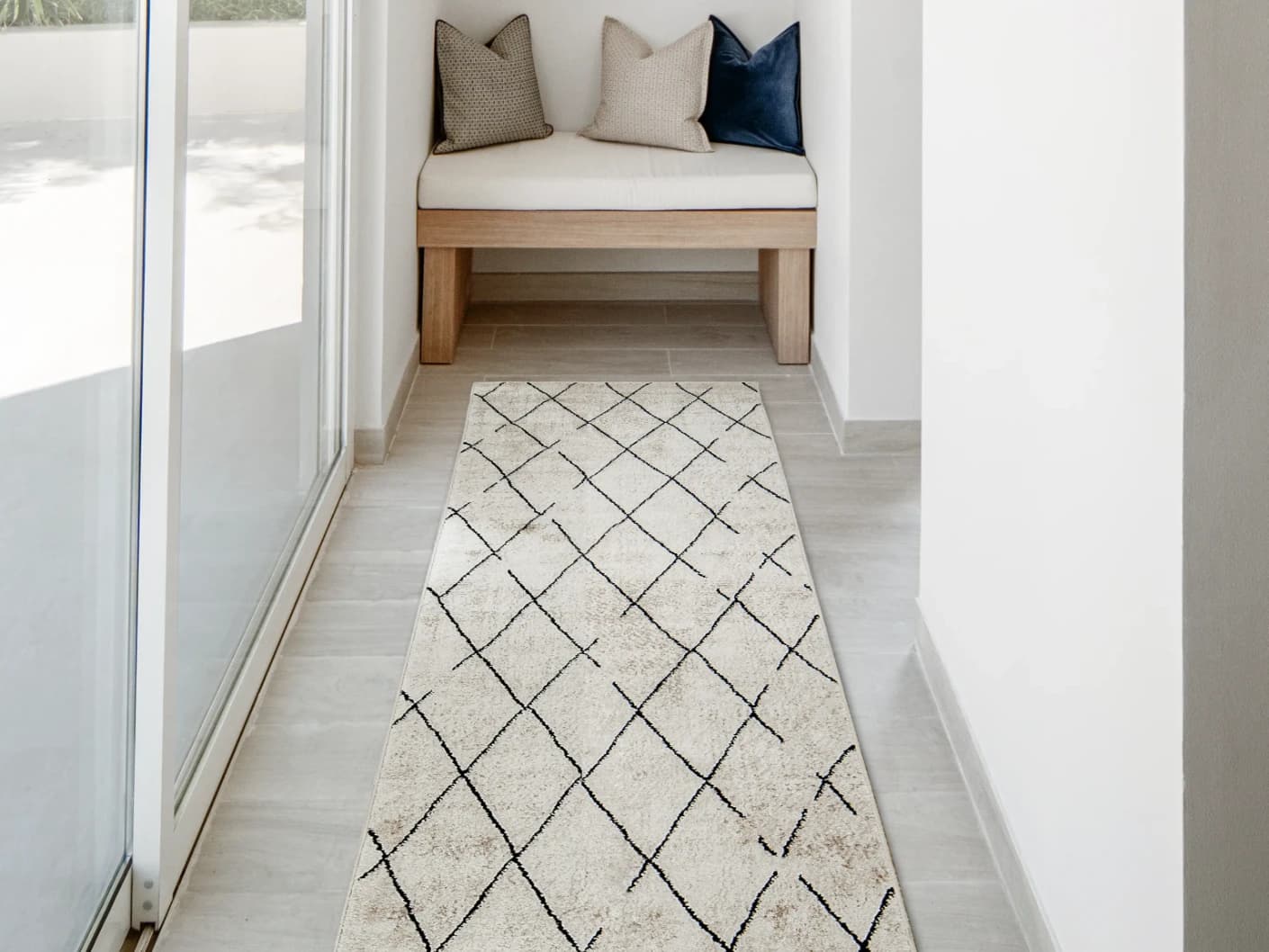 Renzo Ebony Runners carpet in beige, shown in a lifestyle front view