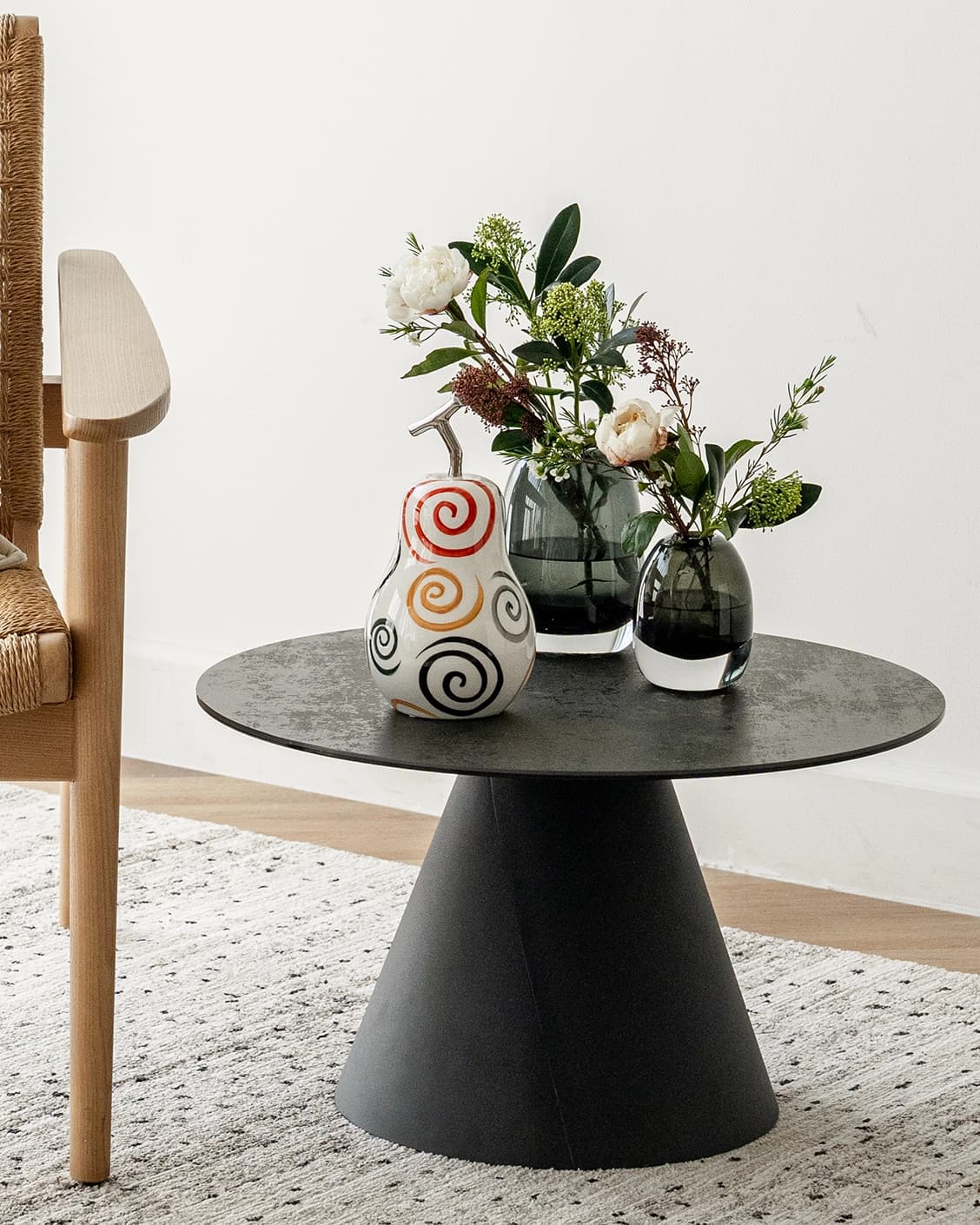 Rhea Arneson statues and sculptures in white, black and red, shown in a lifestyle front view as image 2