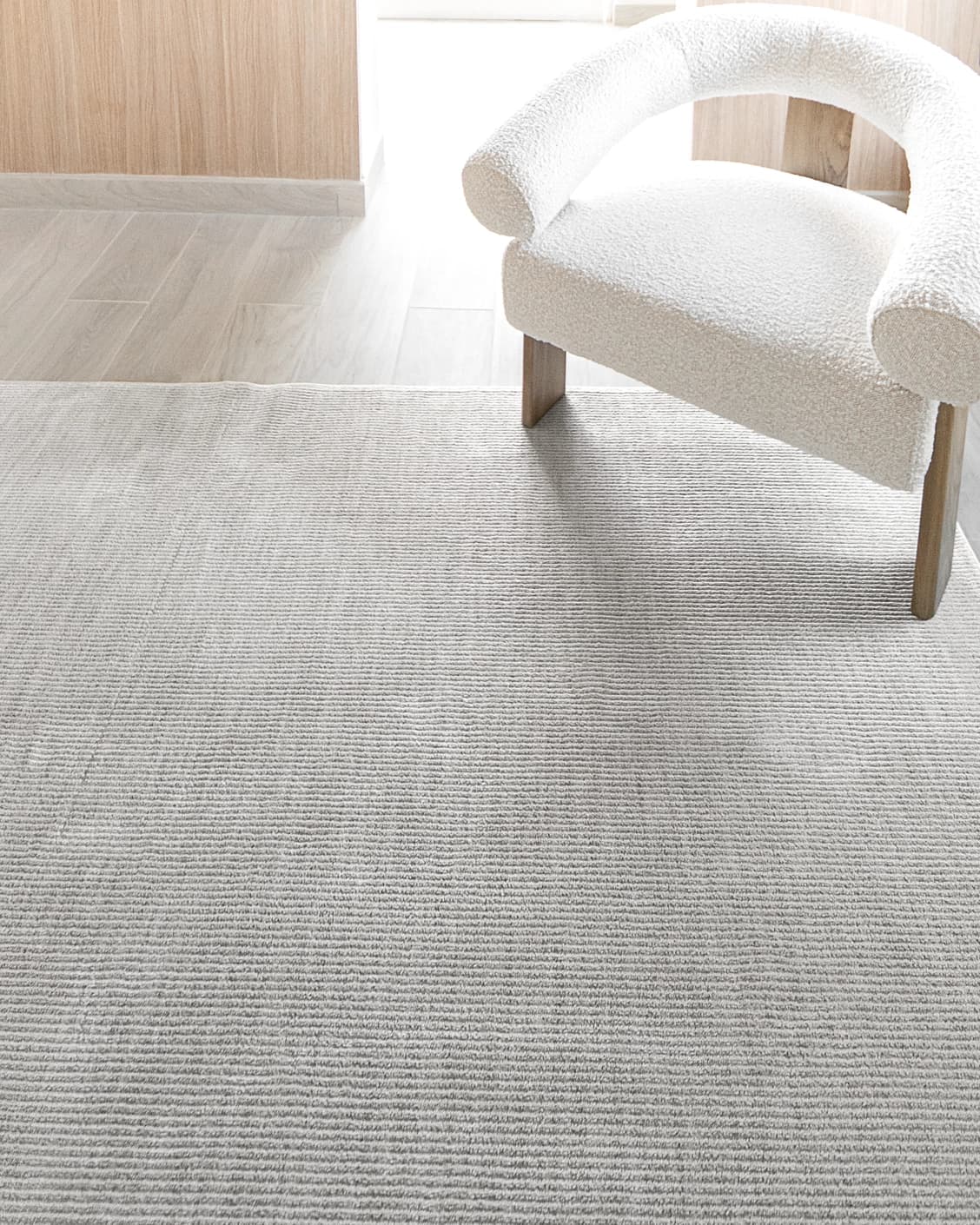 Rik Dune carpet in grey, shown in a lifestyle top view as image 7
