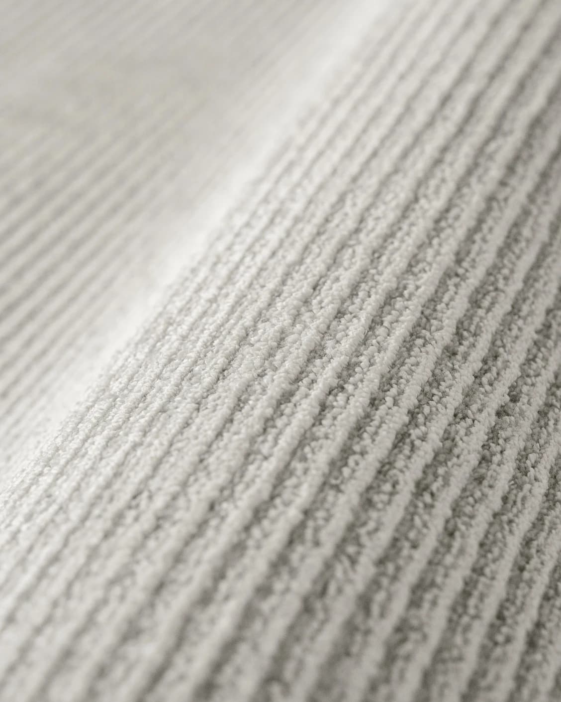 Rik Dune Round carpet in dune and grey, shown in a product close-up as image 7