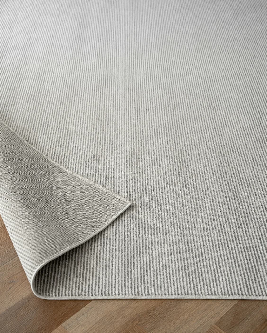 Rik Dune Round carpet in dune and grey, shown in a product close-up as image 6