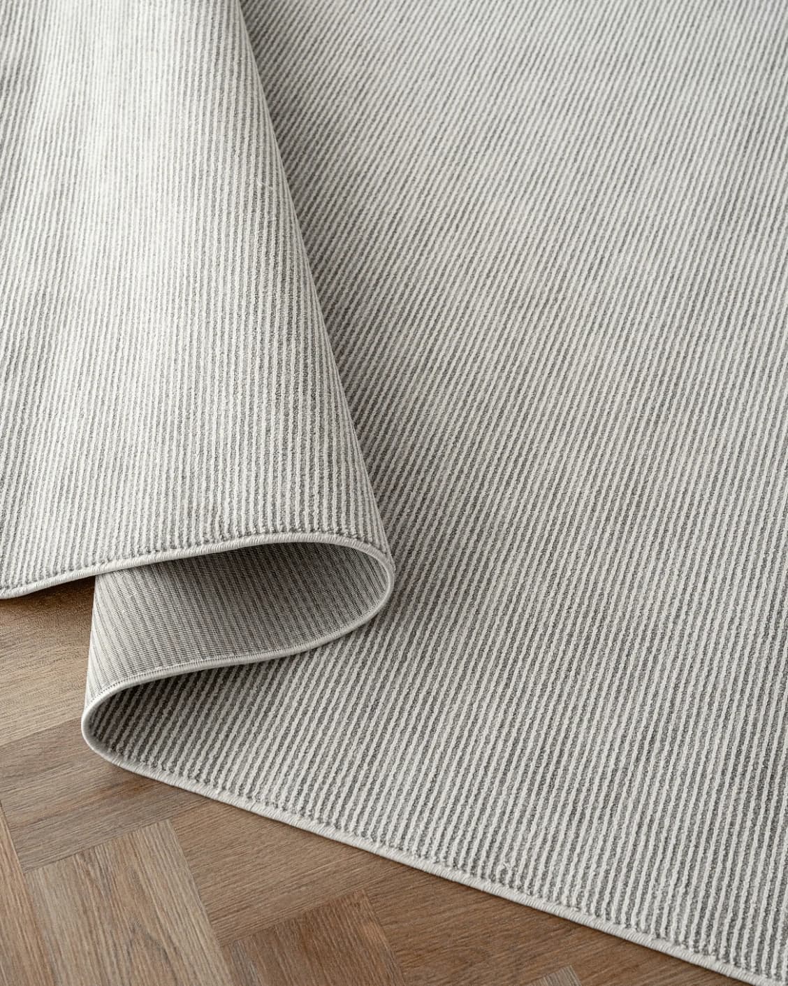Rik Dune Round carpet in dune and grey, shown in a product close-up as image 5