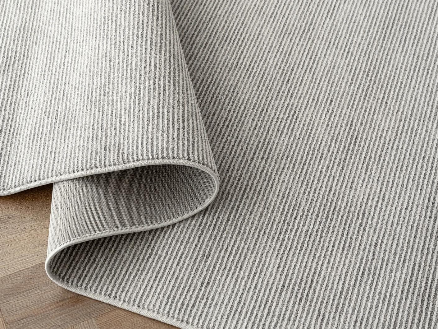Rik Dune carpet in grey, shown in a product close-up as image 10
