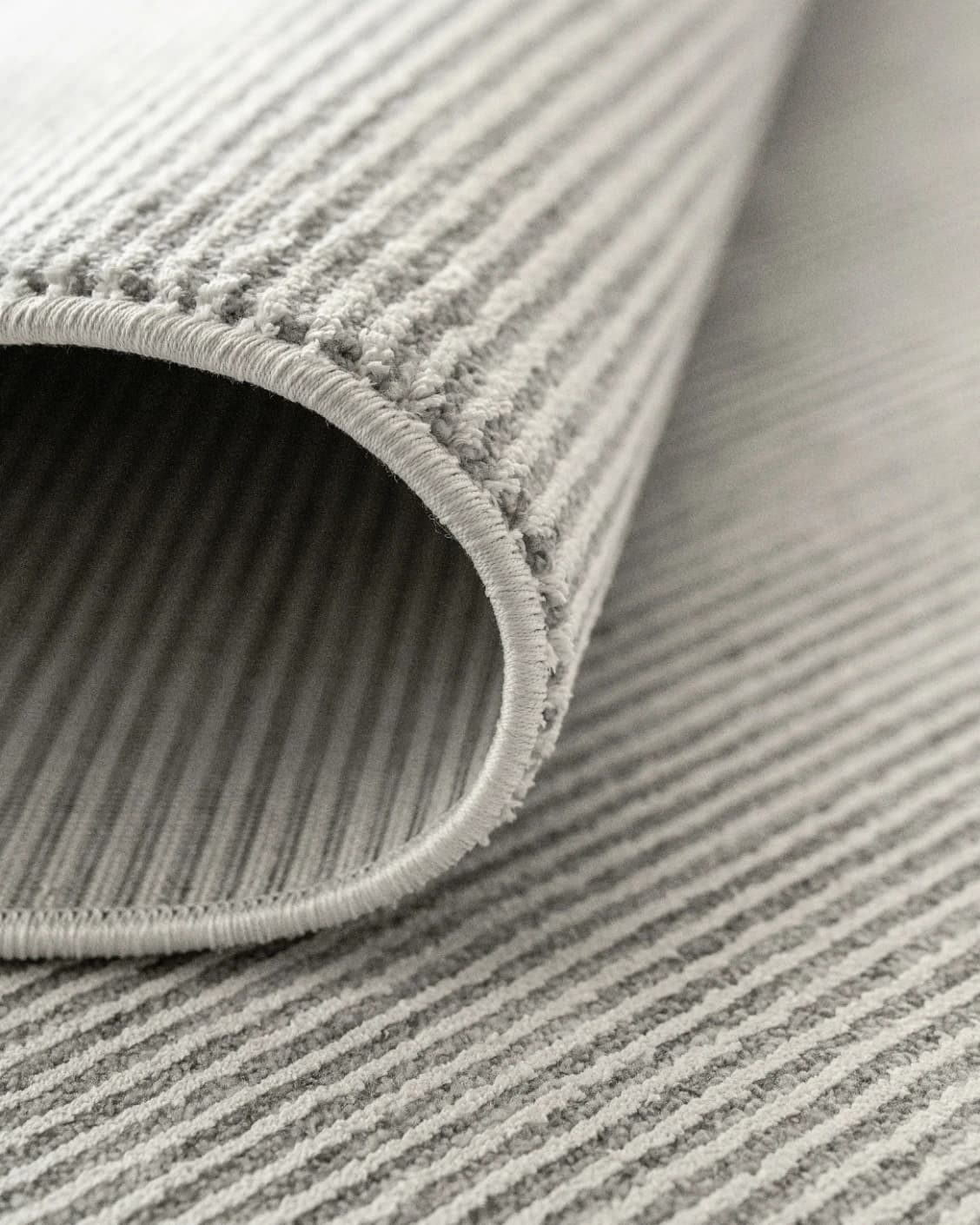 Rik Dune Round carpet in dune and grey, shown in a product close-up as image 8