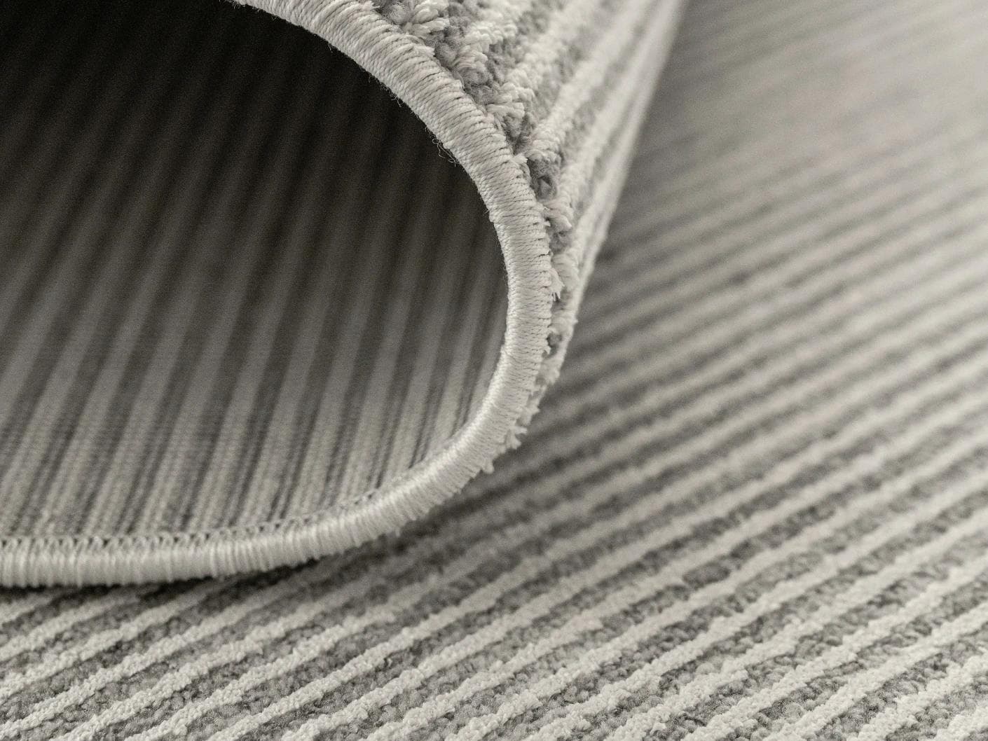 Rik Dune carpet in grey, shown in a product close-up as image 11