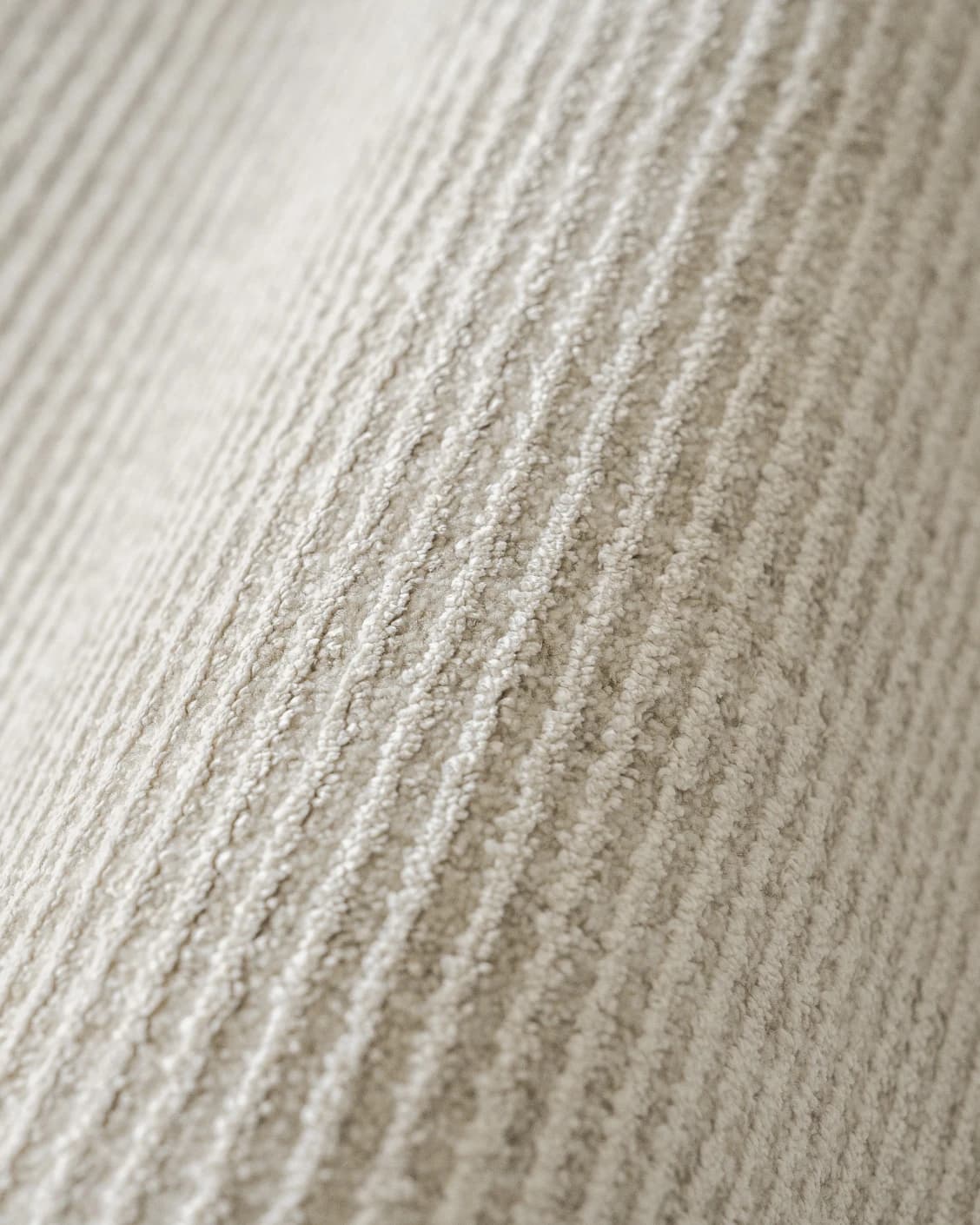 Rik Sandy carpet in beige, shown in a product close-up as image 7