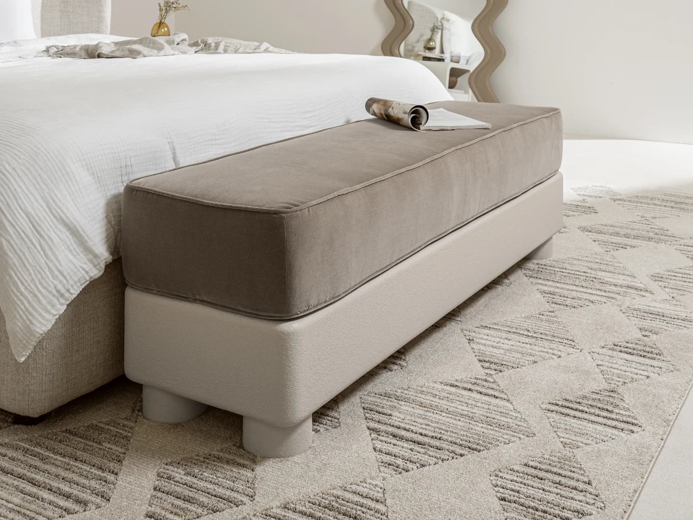 Rina bench in warm taupe, ivory and taupe, shown in a lifestyle left view