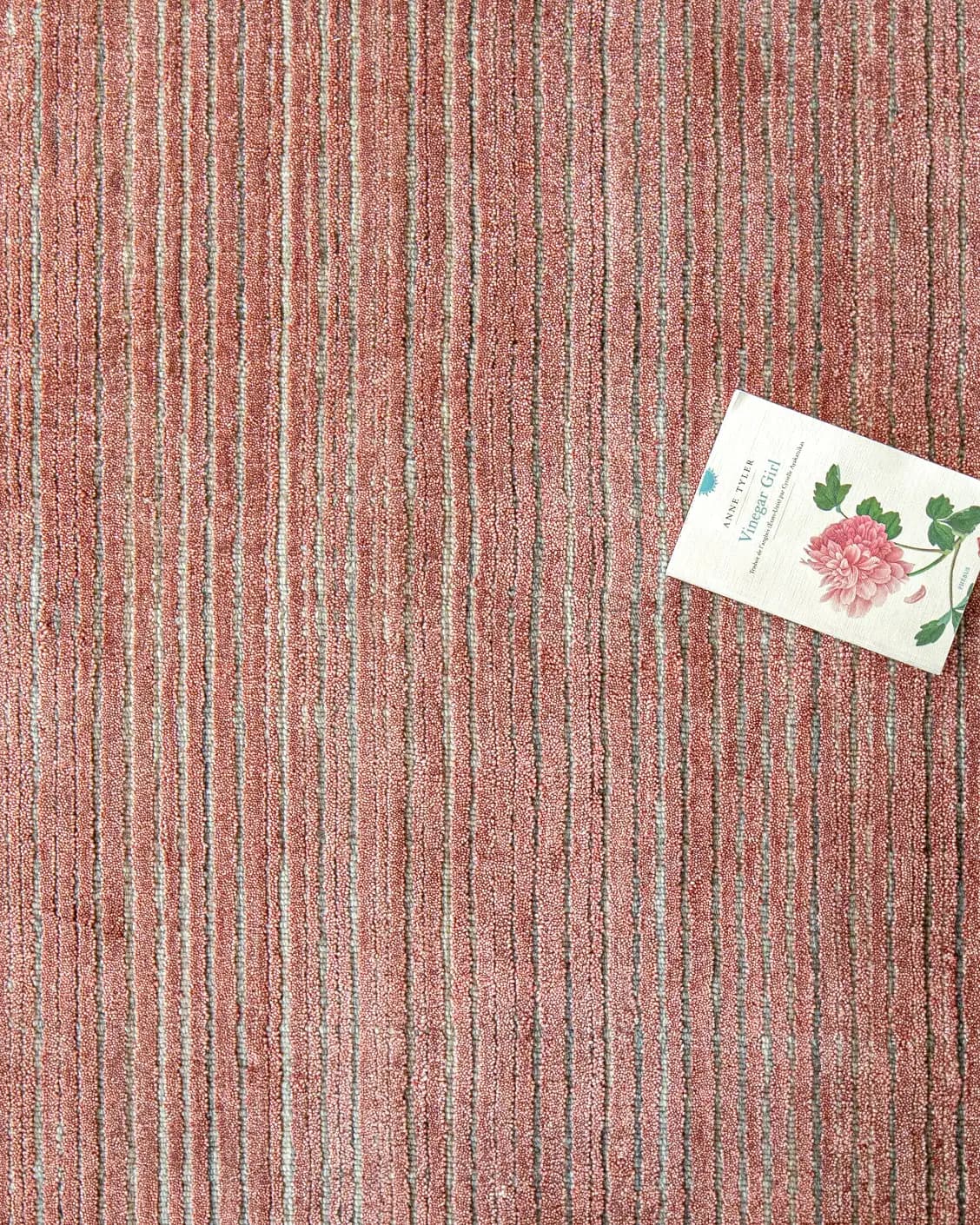 Rita Rosso II carpet in red, shown in a lifestyle top view as image 9