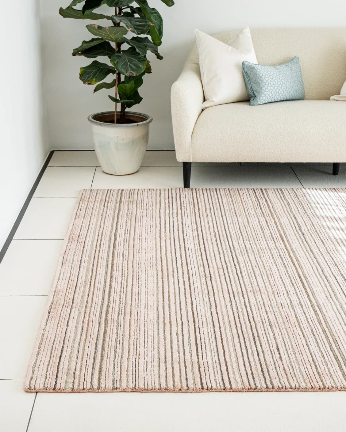 Rita Rosso carpets in pink, shown in a lifestyle front view as image 1