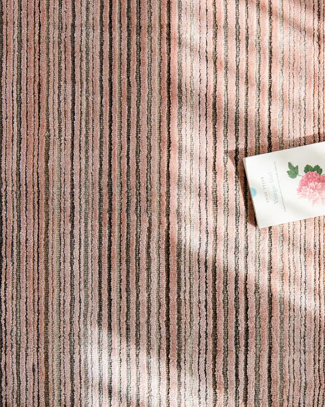 Rita Rosso carpet in pink, shown in a lifestyle top view as image 7