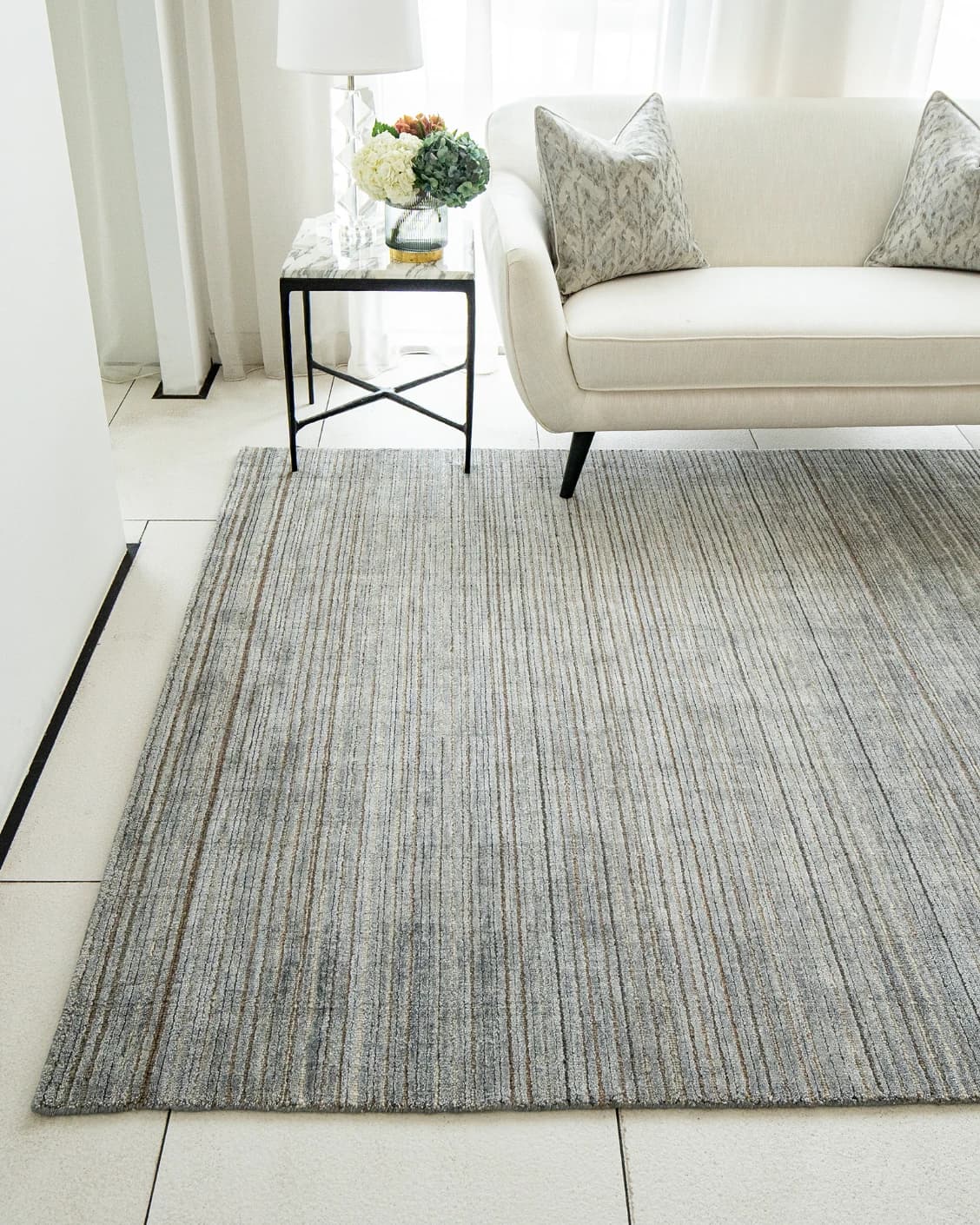 Rita Stevens carpet in grey, shown in a lifestyle front view as image 4