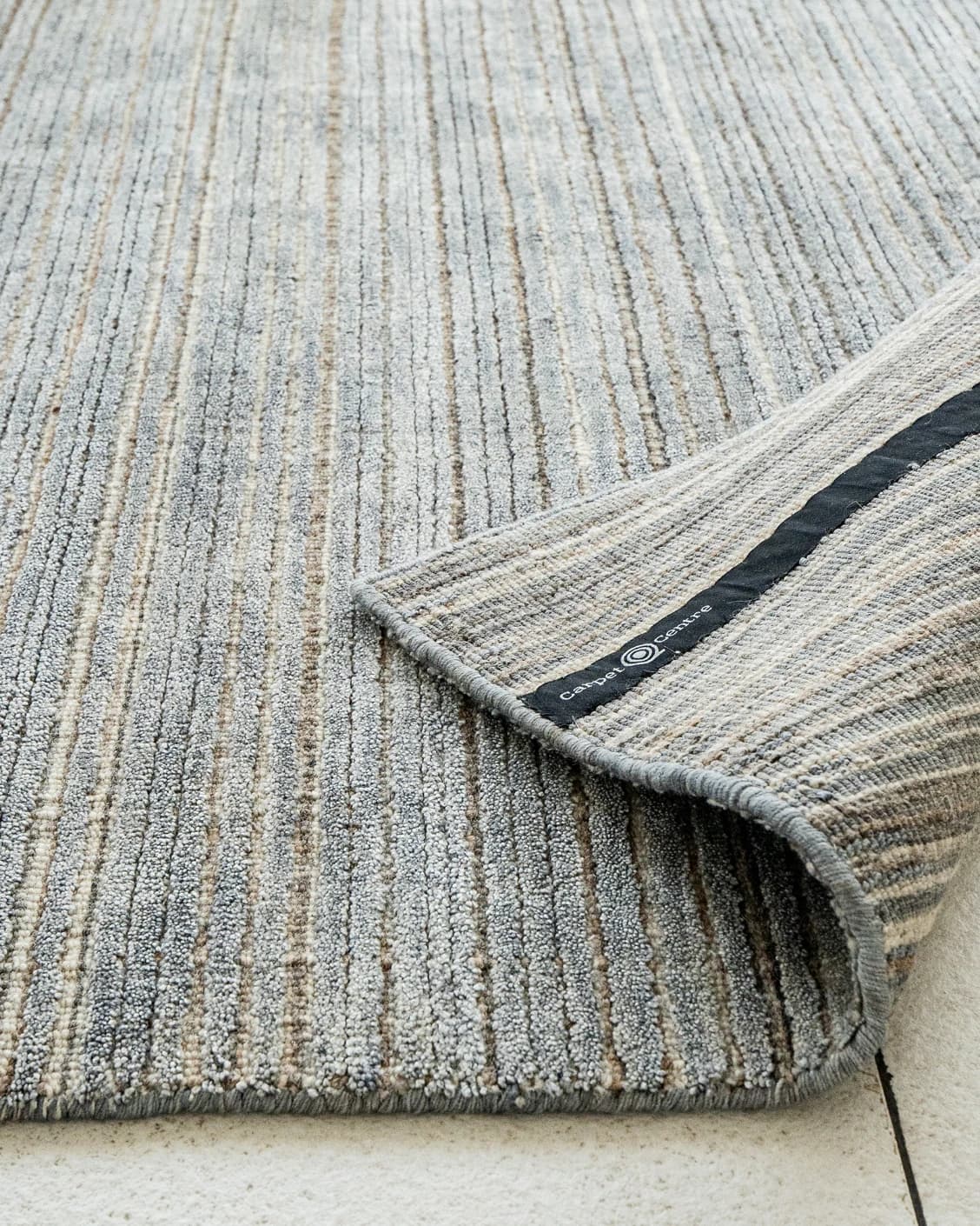 Rita Stevens carpet in grey, shown in a product close-up as image 7