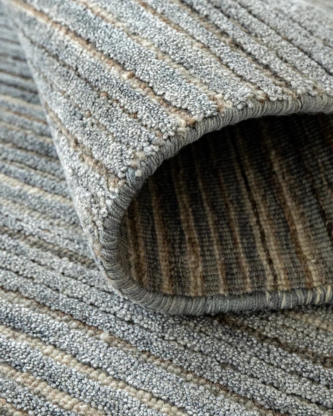 Rita Stevens carpet in grey, shown in a product close-up as image 8
