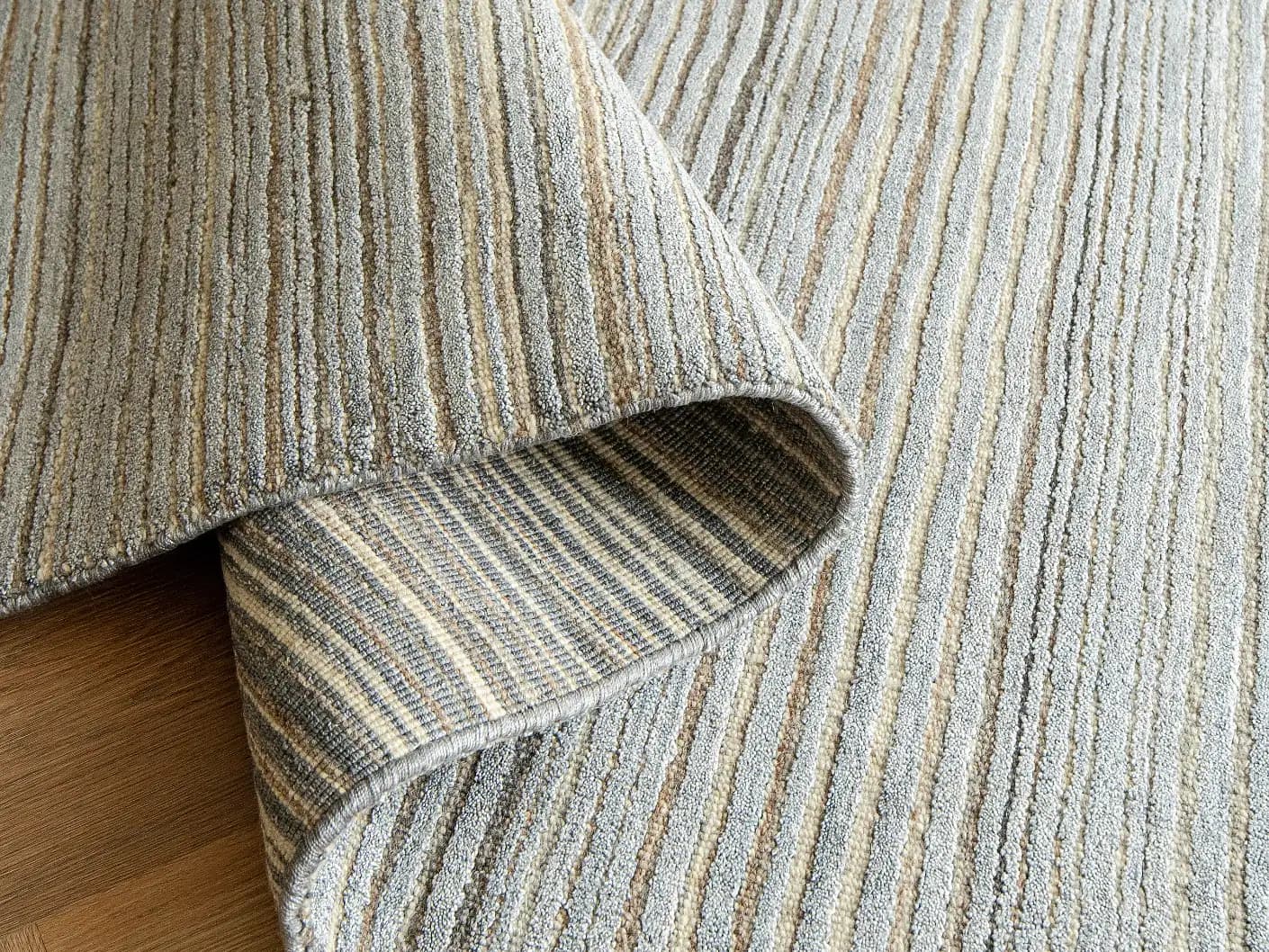Rita Stevens carpets in grey, shown in a product close-up view
