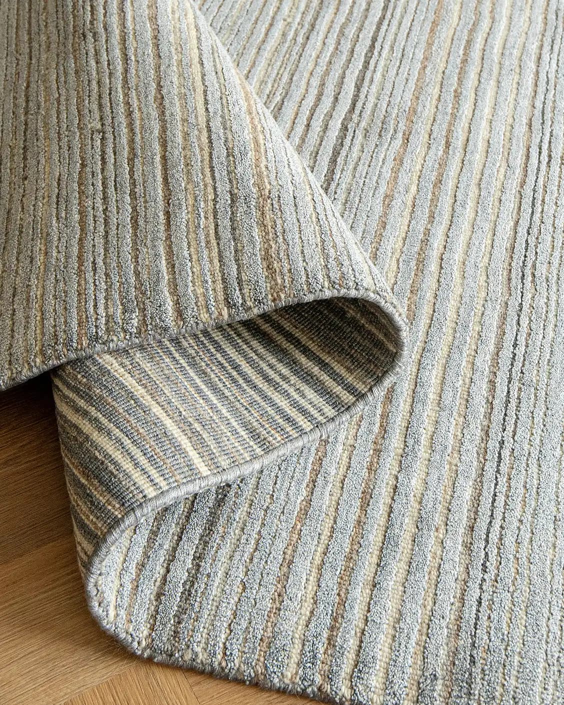 Rita Stevens carpet in grey, shown in a product close-up as image 9