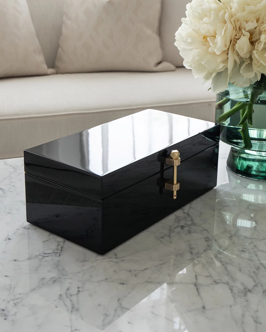 Romare Cornell accessory in black, shown in a lifestyle left view