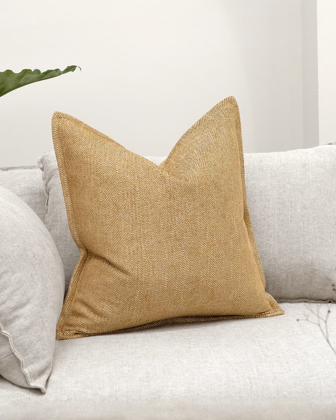 Rue Gaze cushion in beige, shown in a lifestyle as image 2
