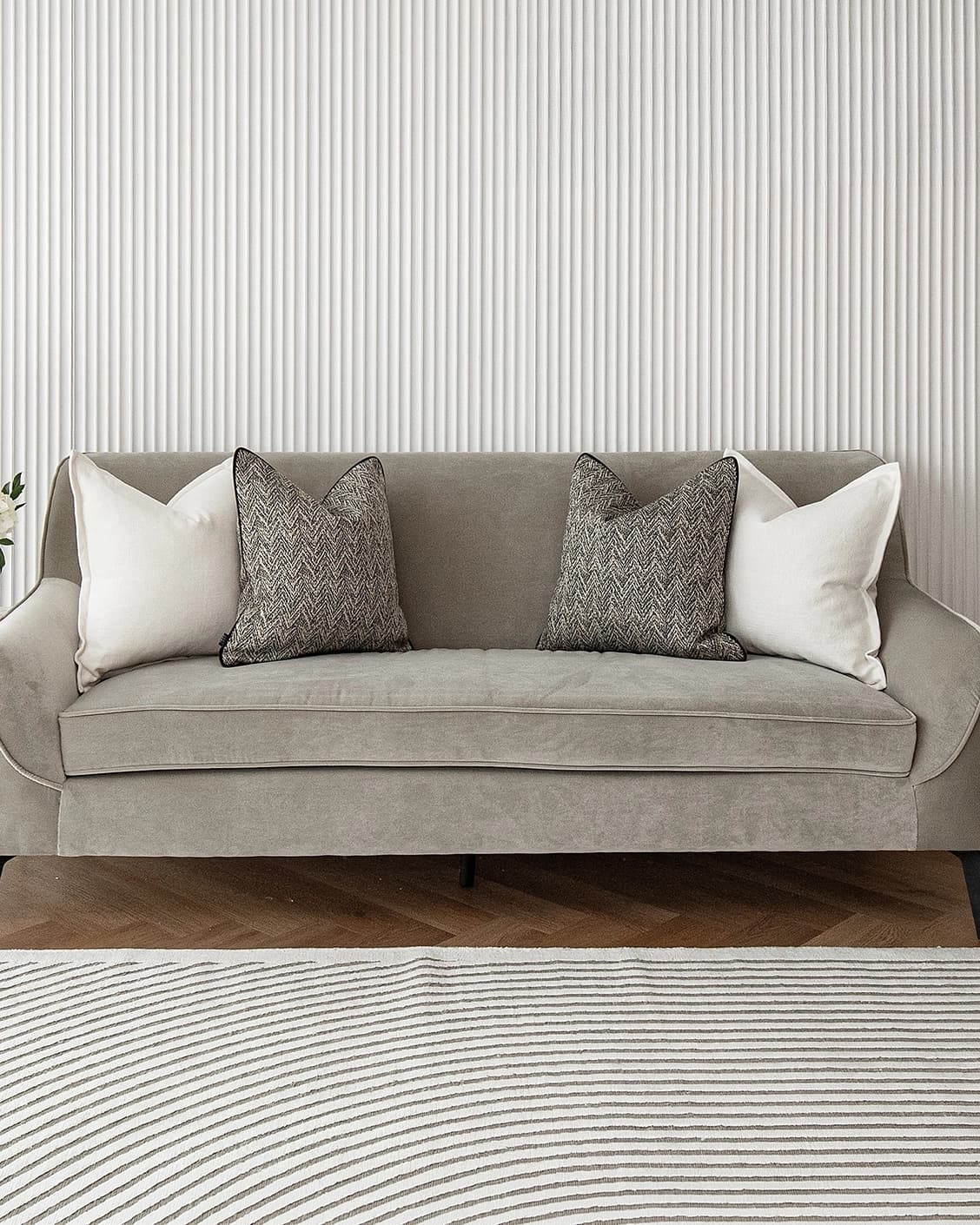 Rusman Bundle cushion in black and white, shown in a lifestyle front view as image 2