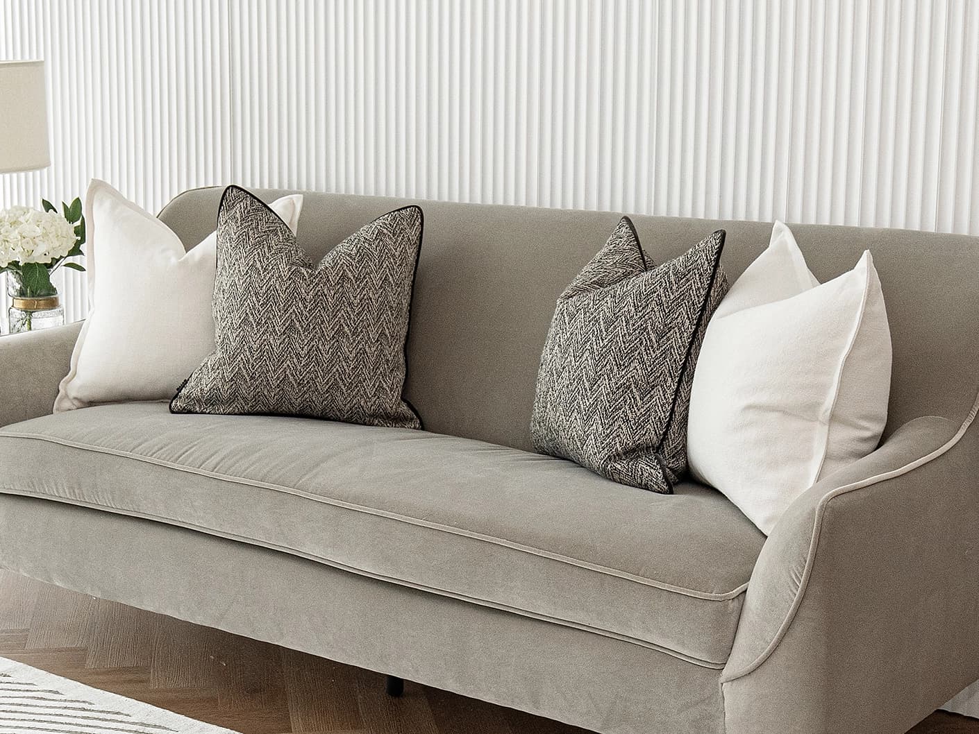 Rusman Bundle bundle cushions in black and white, shown in a lifestyle front view