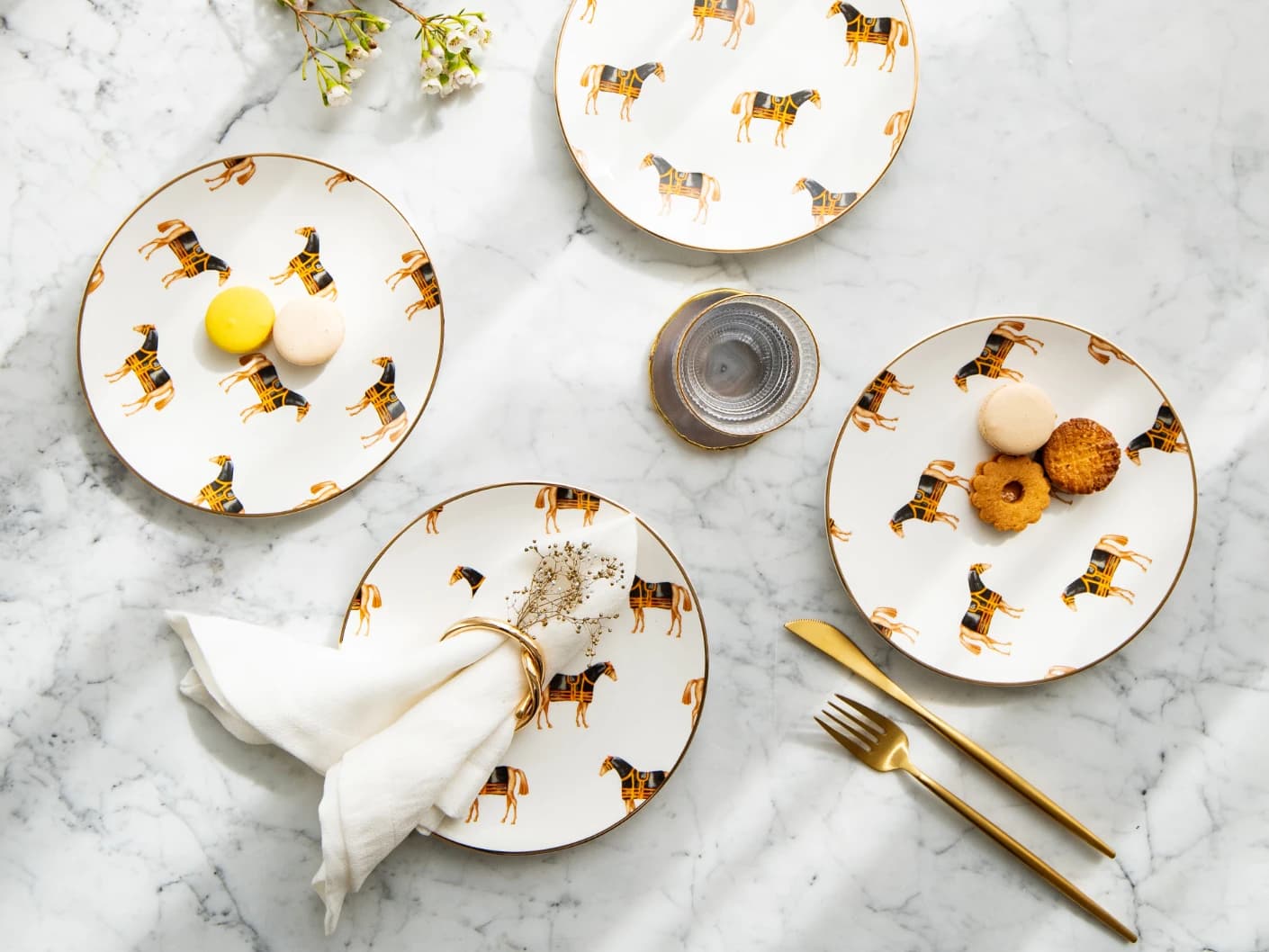 Sabina Viktoria plates in white, shown in a lifestyle top view