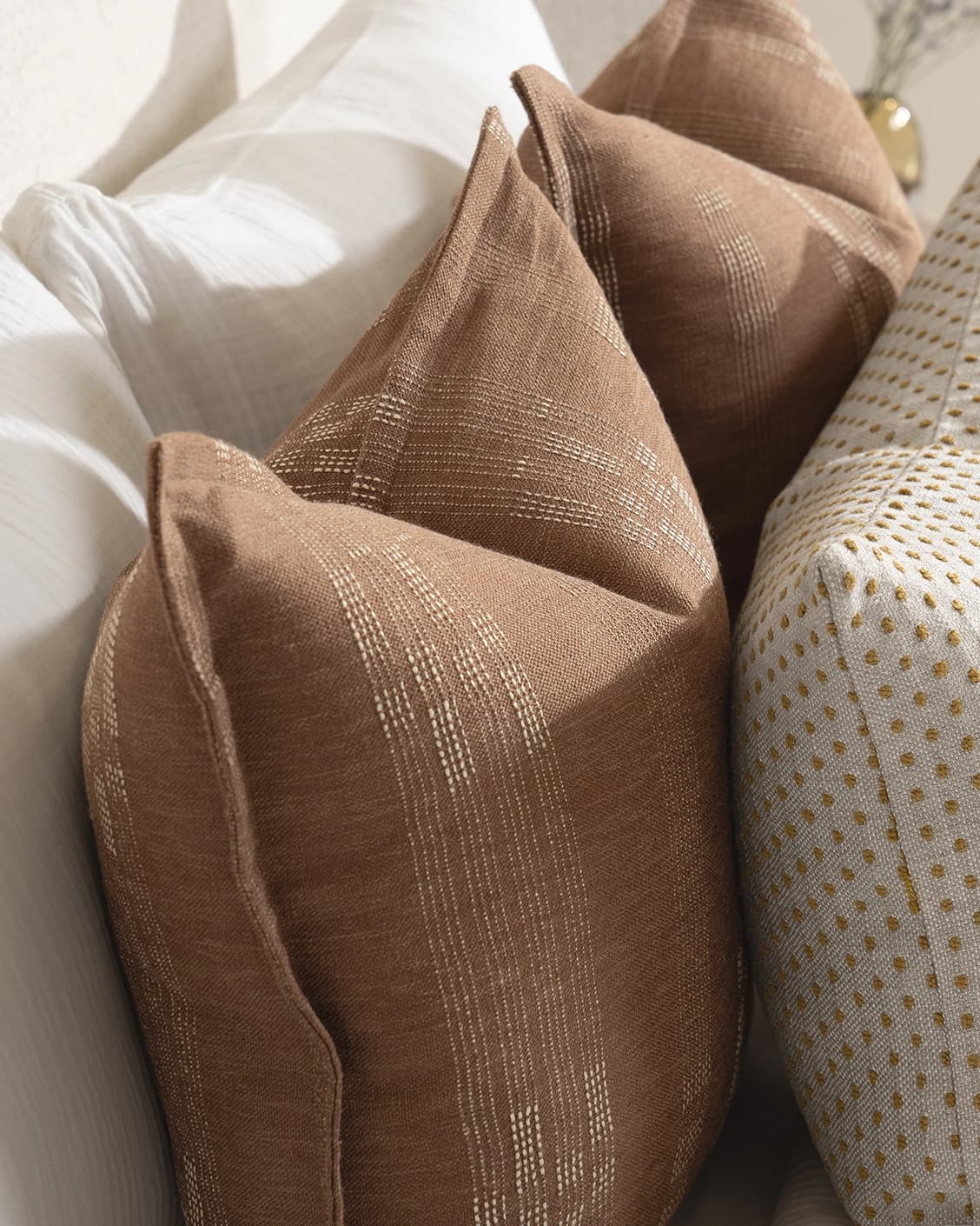 Sam Bundle bundle - indoor in brown, orange and beige, shown in a lifestyle close-up top view as image 1