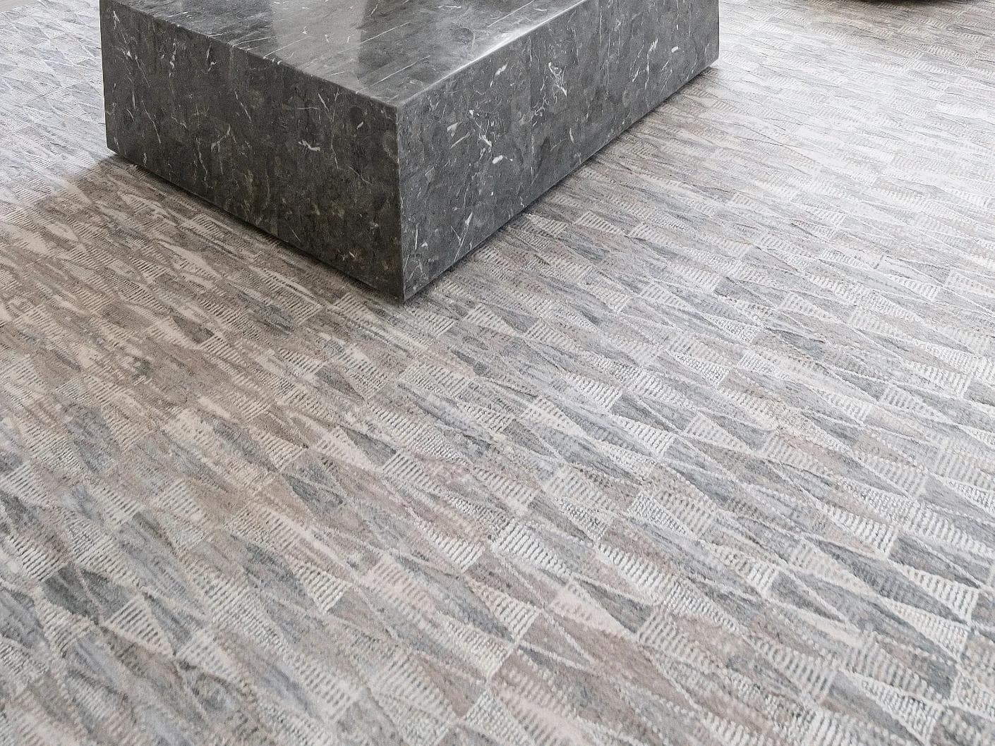 Savanna Sky carpets in blue, beige and grey, shown in a lifestyle close-up as image 2