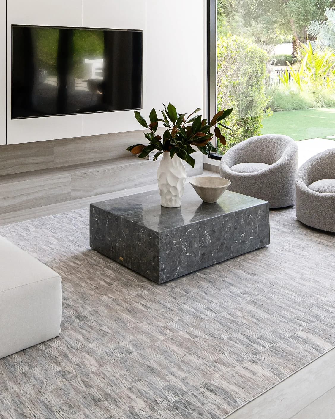 Savanna Sky carpet in blue, beige and grey, shown in a lifestyle left view as image 6