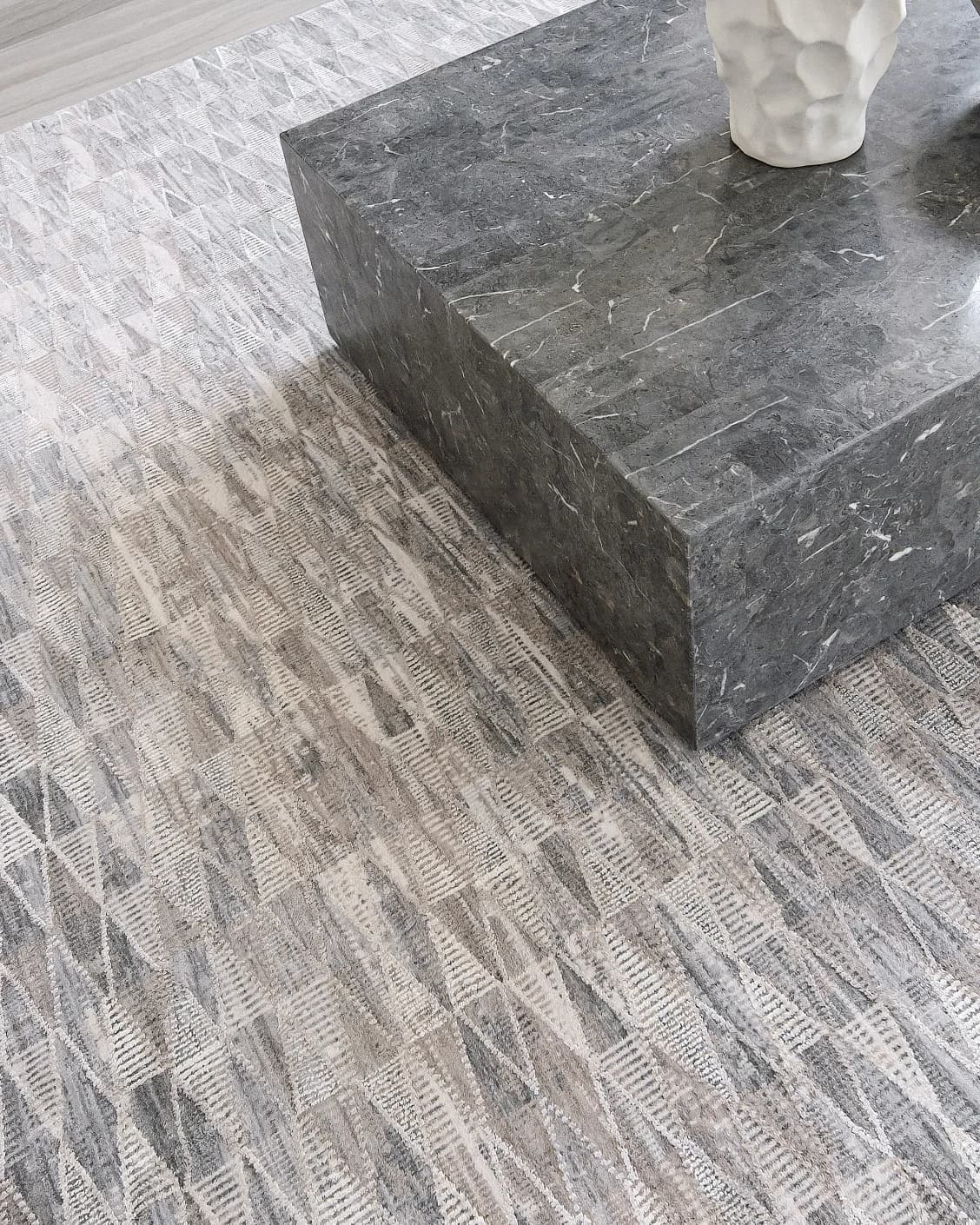 Savanna Sky carpet in blue, beige and grey, shown in a lifestyle top view as image 8