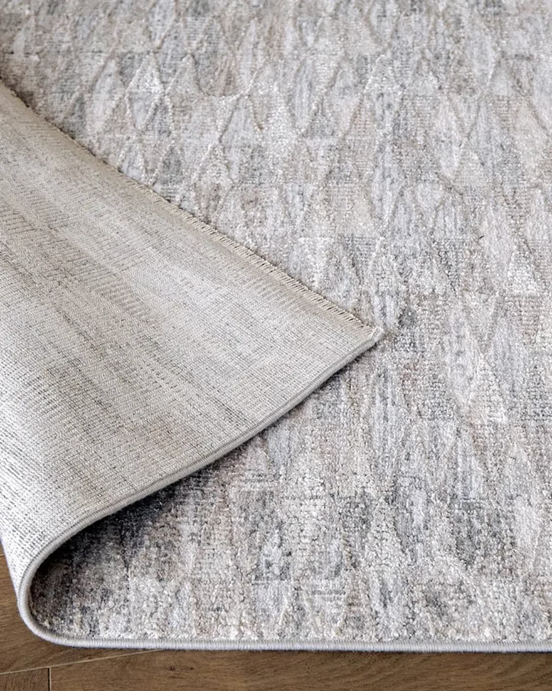 Savanna Sky carpet in blue, beige and grey, shown in a product close-up as image 9