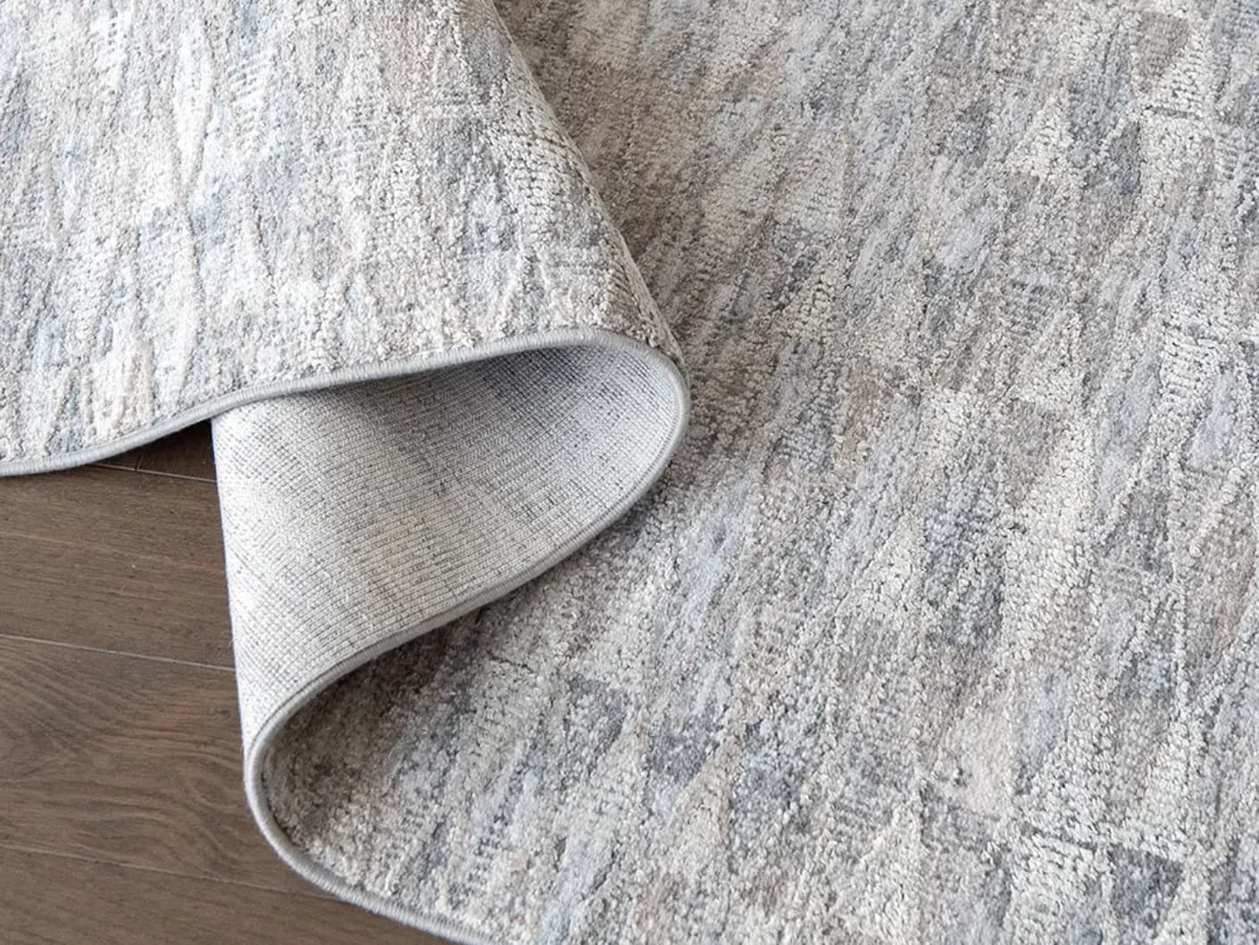 Savanna Sky carpets in sky, blue, beige and grey, shown in a product close-up view