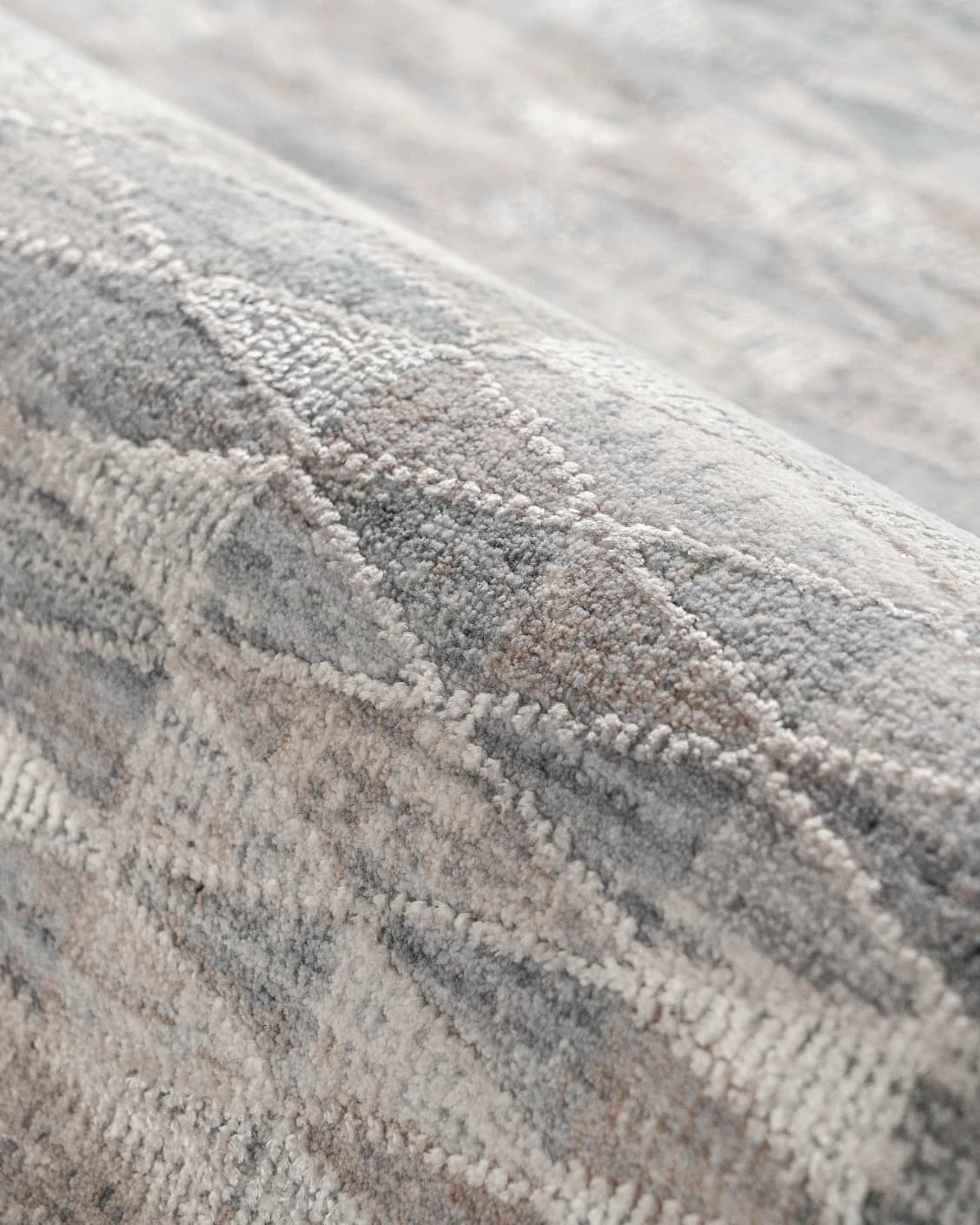 Savanna Sky carpet in blue, beige and grey, shown in a product close-up as image 12