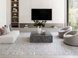 Savanna Sky carpet in sky, blue, beige and grey, shown in a lifestyle front view