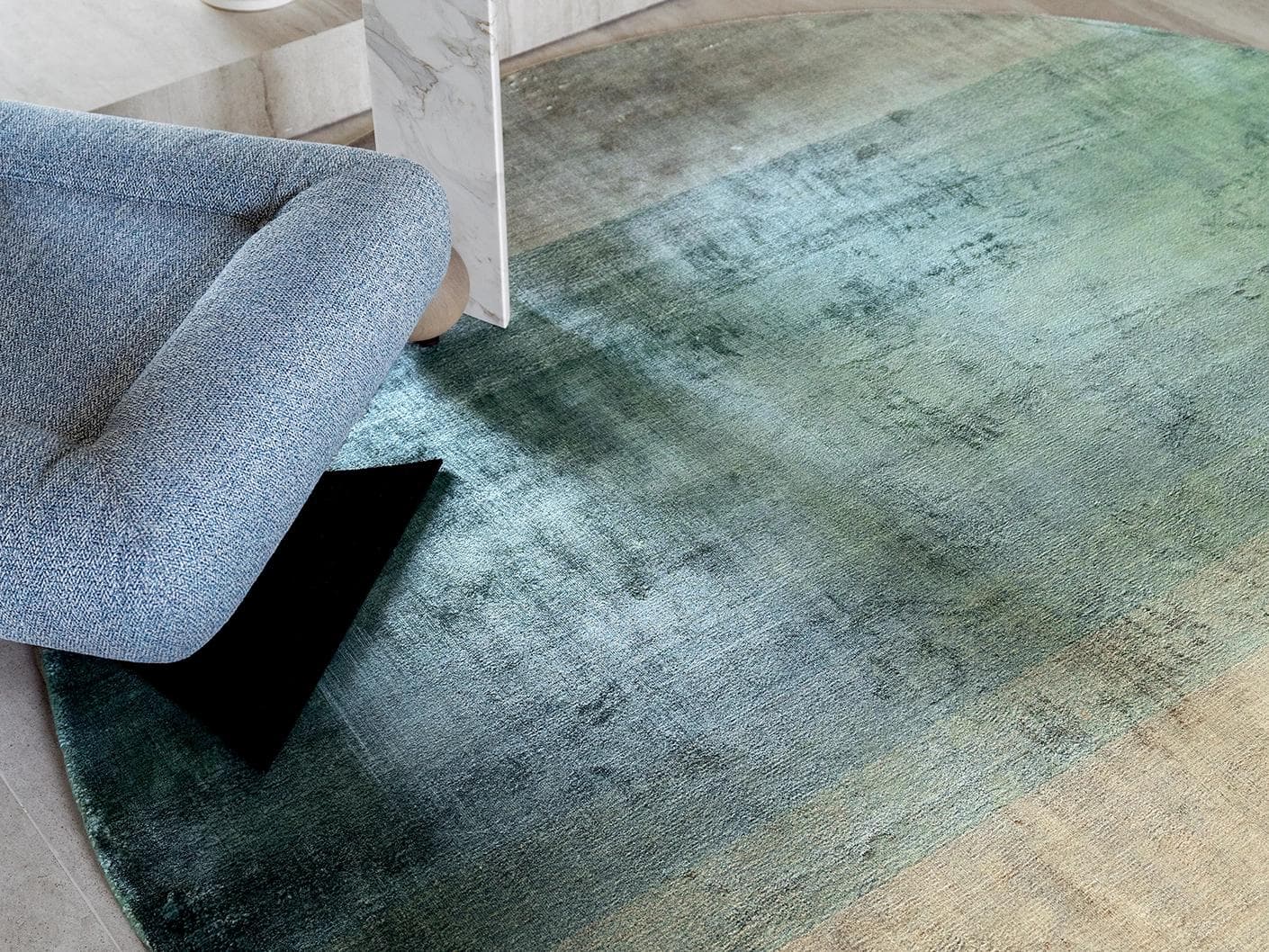 Scarlette Sage Round carpet in beige and green, shown in a lifestyle close-up top view as image 4