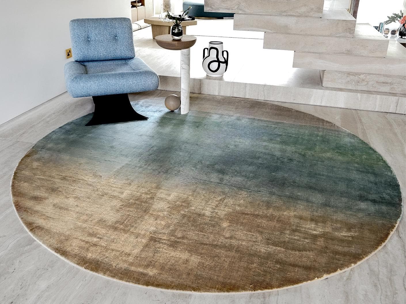 Scarlette Sage Round carpet in beige and green, shown in a lifestyle front view as image 5