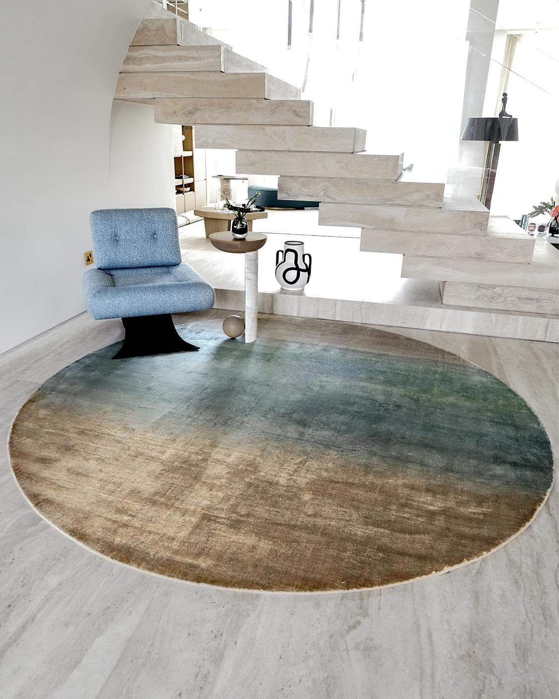 Scarlette Sage Round carpet in beige and green, shown in a lifestyle front view as image 5