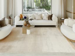 Scarlette Sandy carpet in sandy, beige and gold, shown in a lifestyle front view