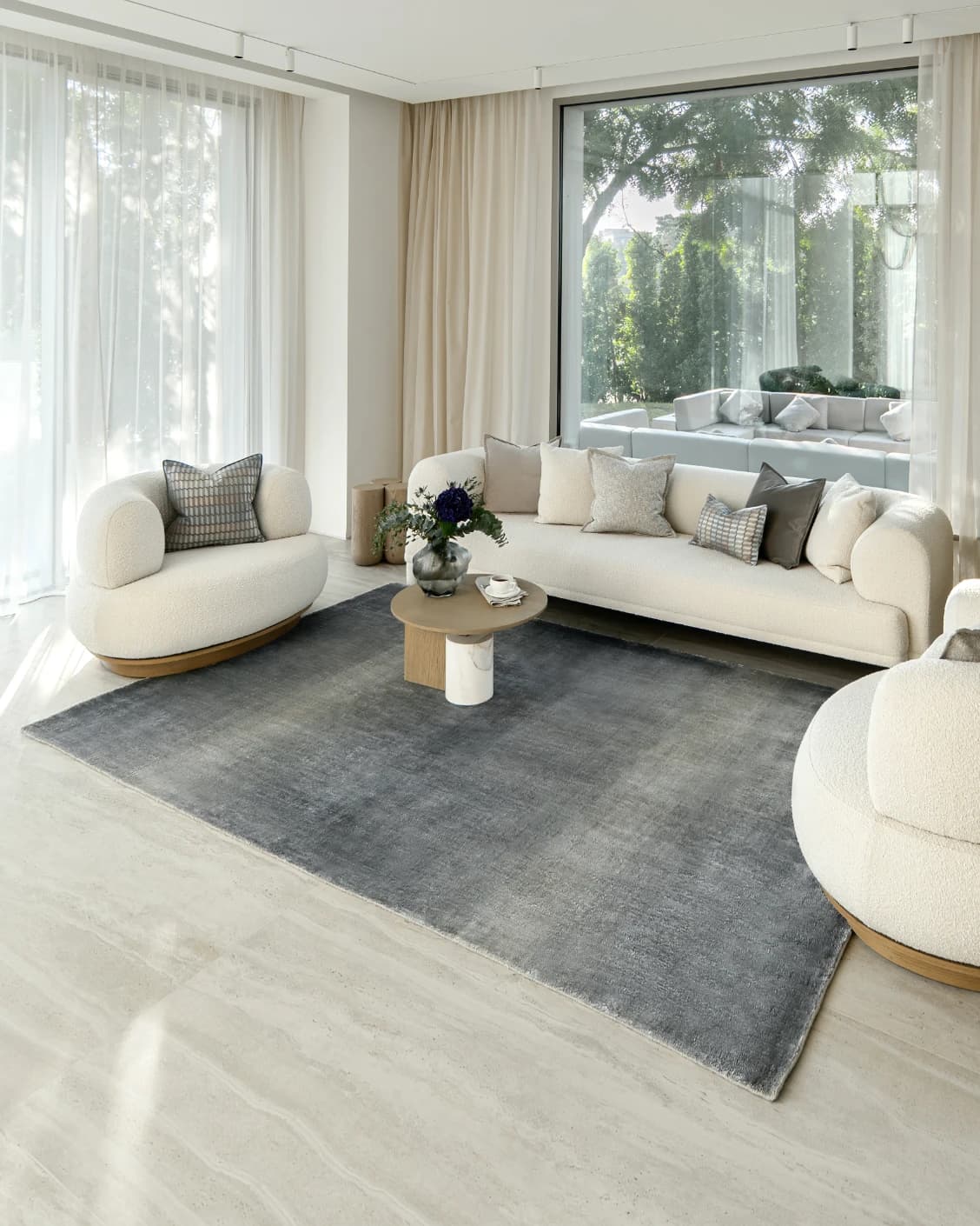 Scarlette Sky carpet in blue, shown in a lifestyle right view as image 8
