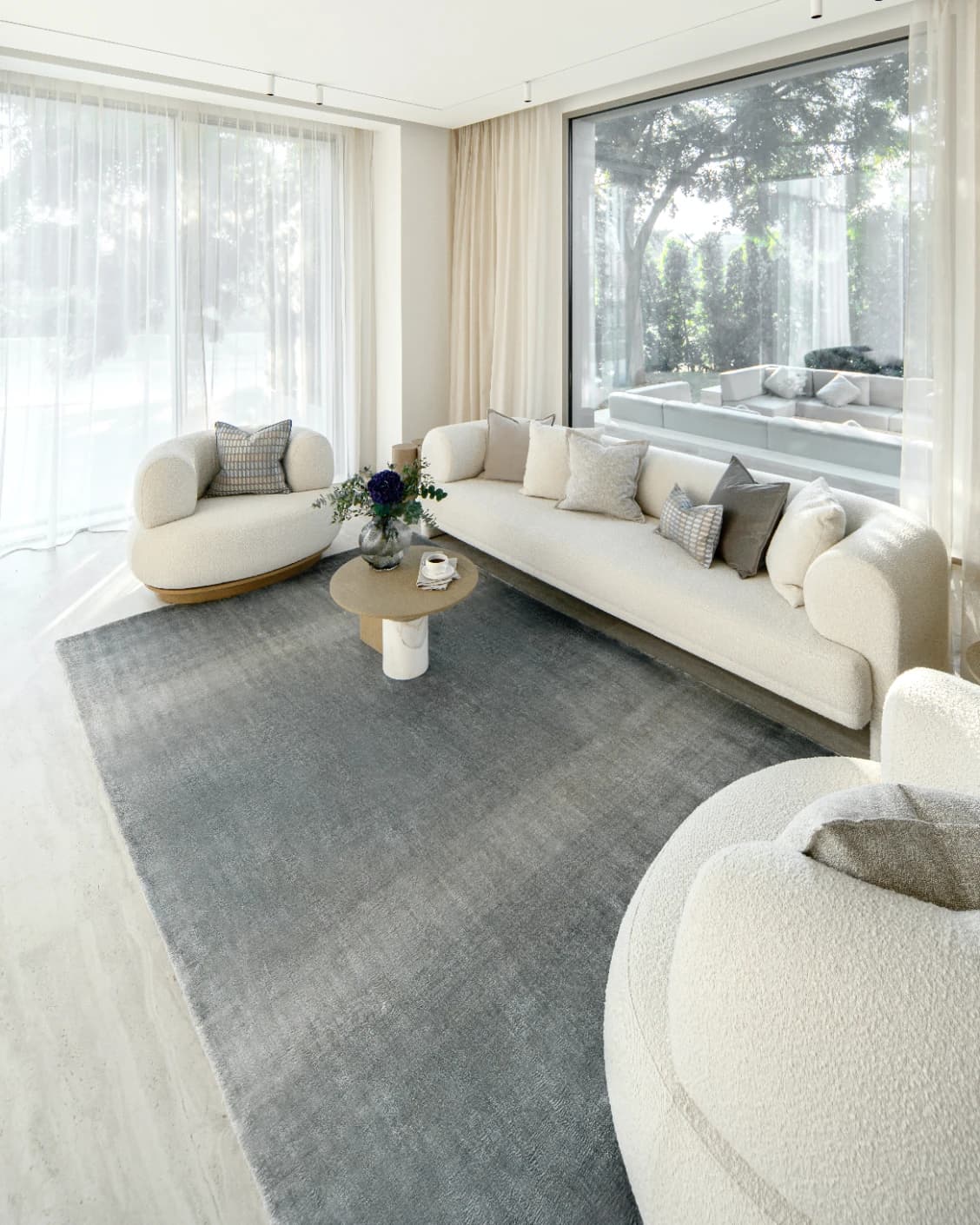 Scarlette Sky carpet in blue, shown in a lifestyle right view as image 9