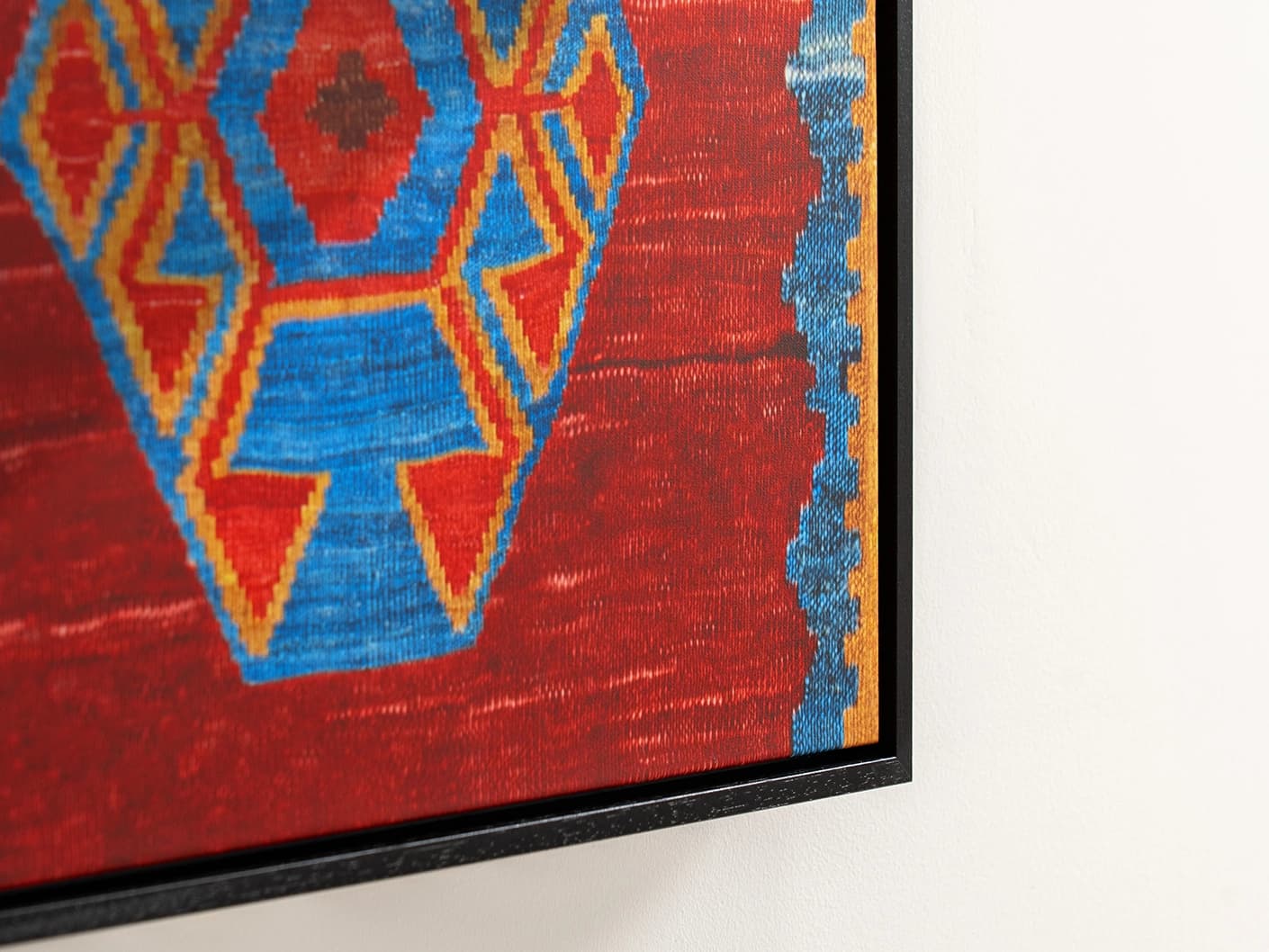 Scorpio canvas in red and blue, shown in a lifestyle close-up as image 2