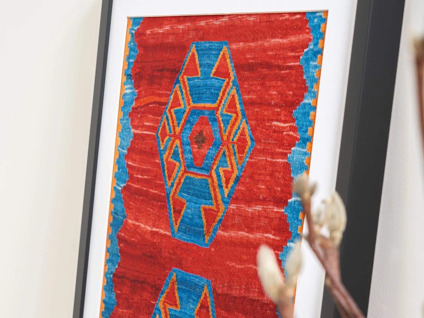 Scorpio fine art print in red and blue, shown in a lifestyle close-up view as image 2