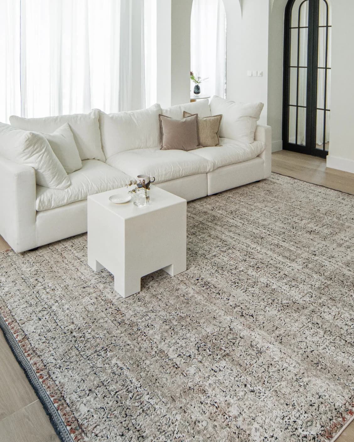 Sheldon Dune carpet in beige, shown in a lifestyle left view as image 5