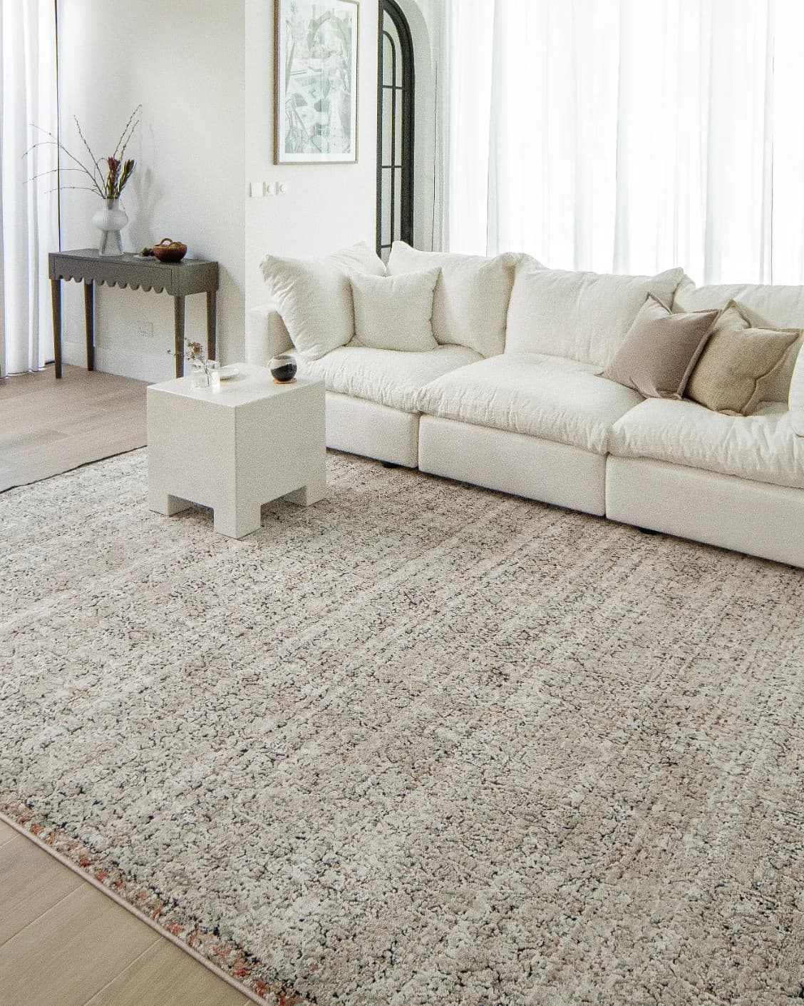 Sheldon Dune carpet in beige, shown in a lifestyle right view as image 6