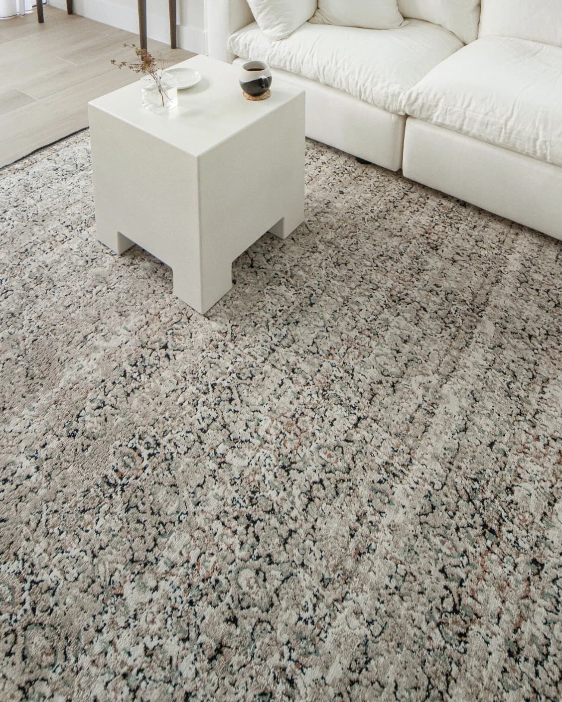 Sheldon Dune carpet in beige, shown in a lifestyle top view as image 8