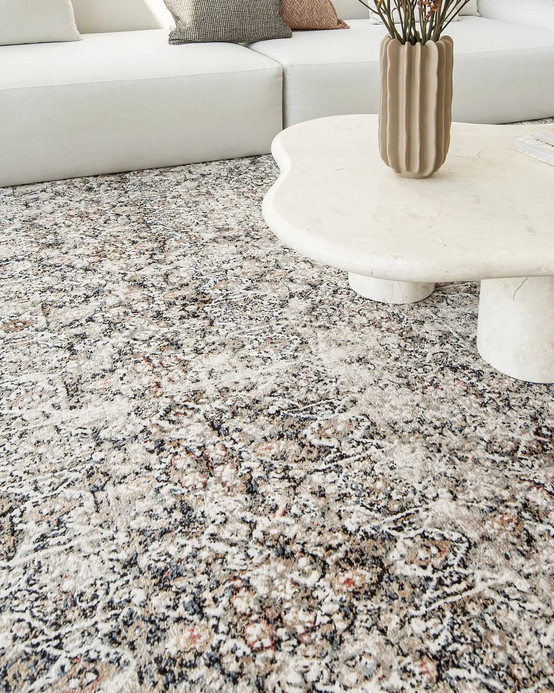 Sheldon Ebony carpet in black and beige, shown in a lifestyle close-up as image 5