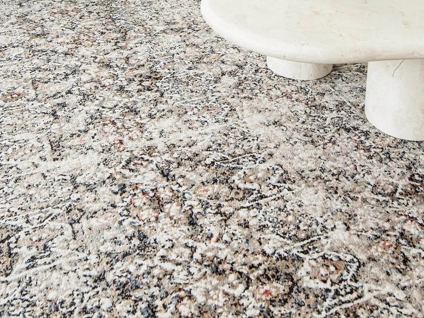 Sheldon Ebony carpet in black and beige, shown in a lifestyle close-up as image 5