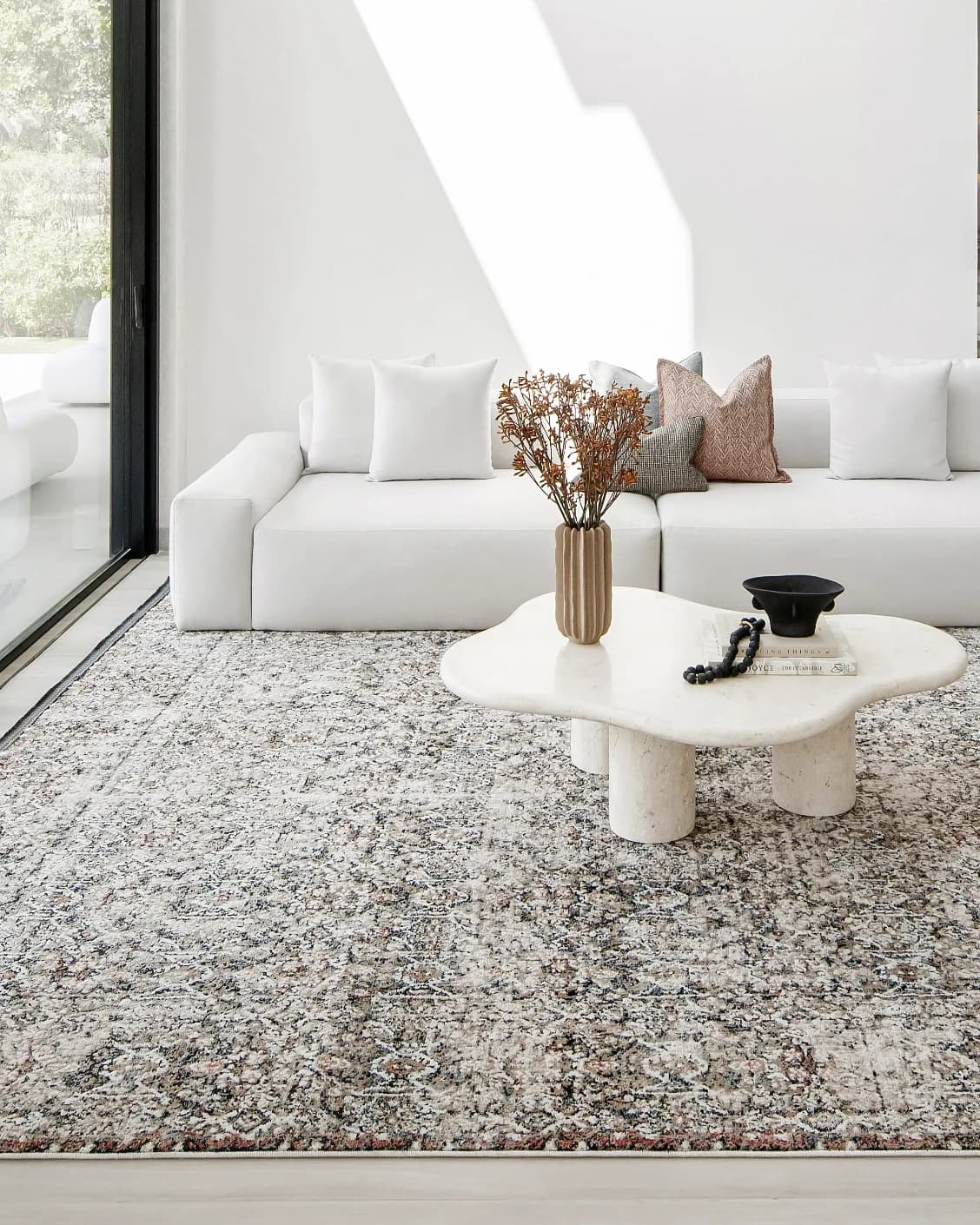 Sheldon Ebony carpet in black and beige, shown in a lifestyle front view as image 6