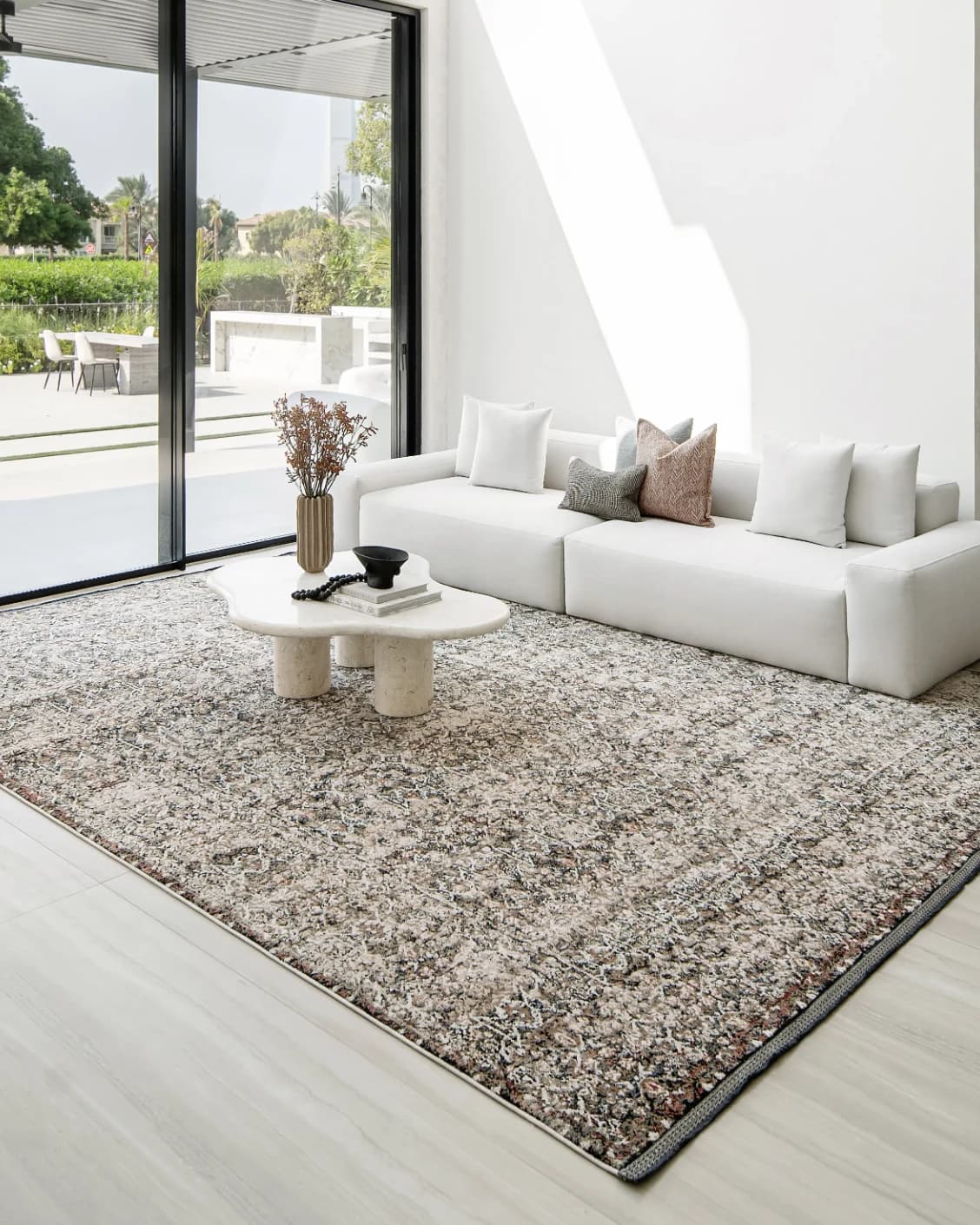 Sheldon Ebony carpet in black and beige, shown in a lifestyle right view as image 8
