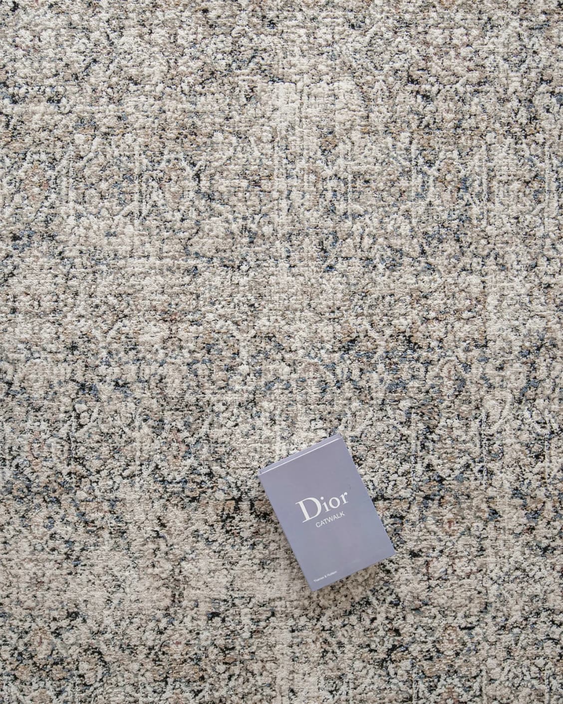 Sheldon Ebony carpet in black and beige, shown in a lifestyle top view as image 9