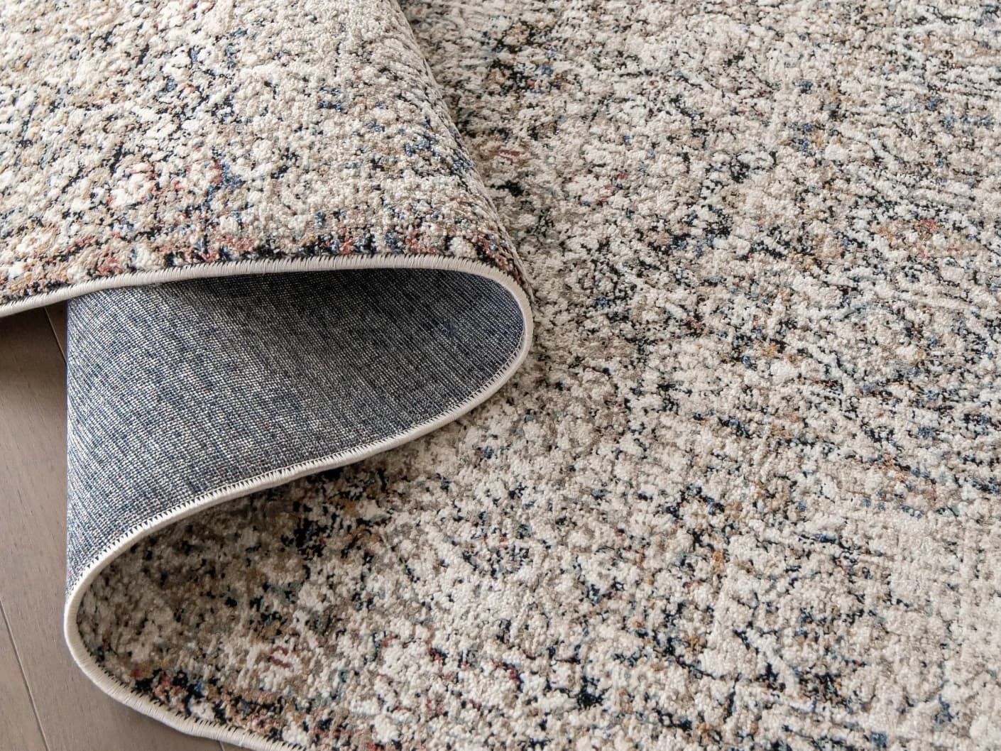 Sheldon Ebony Runners carpets in ebony, black and beige, shown in a product close-up view